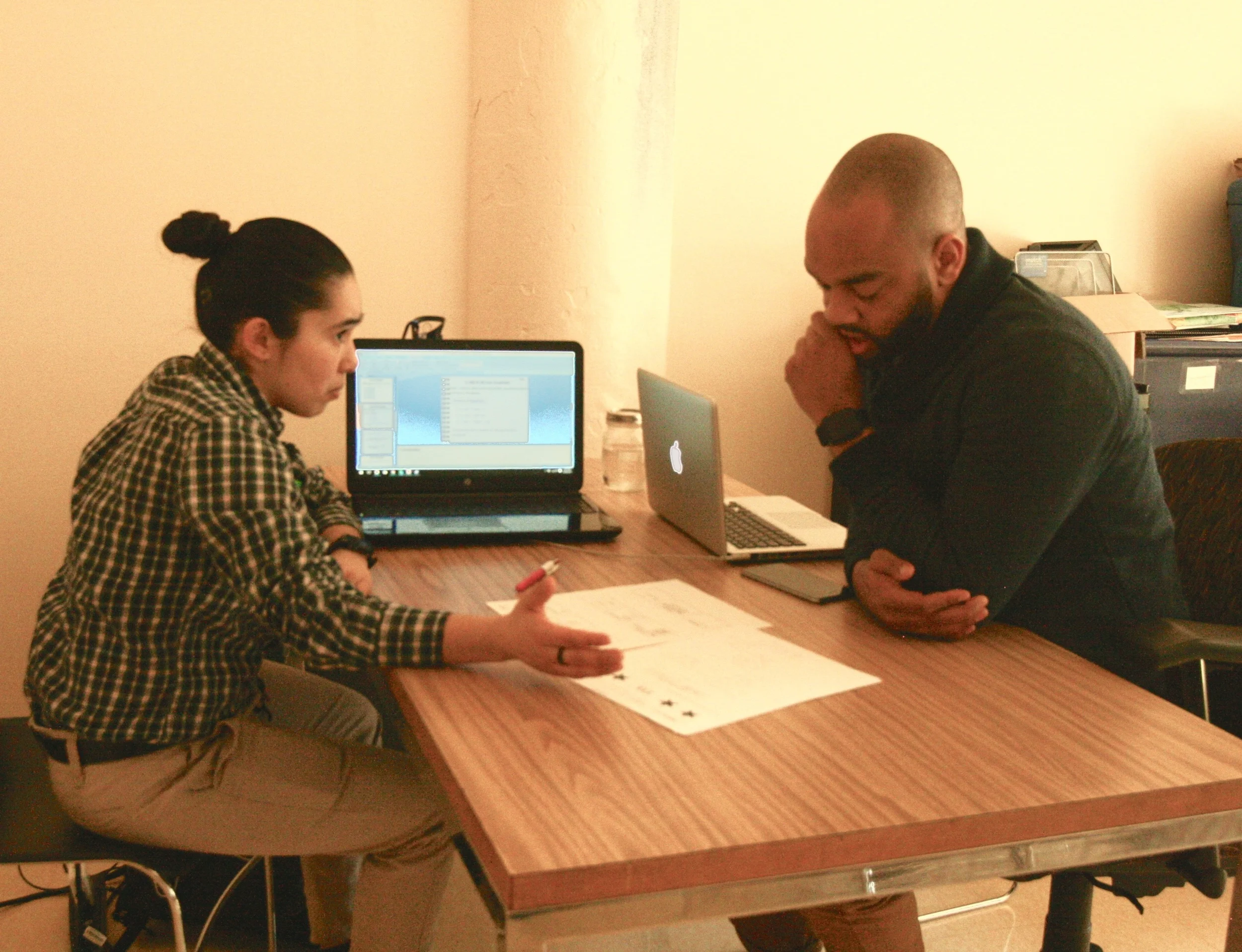 Miranda-Gomez meets with her Sposato coach, Jawad Brown.