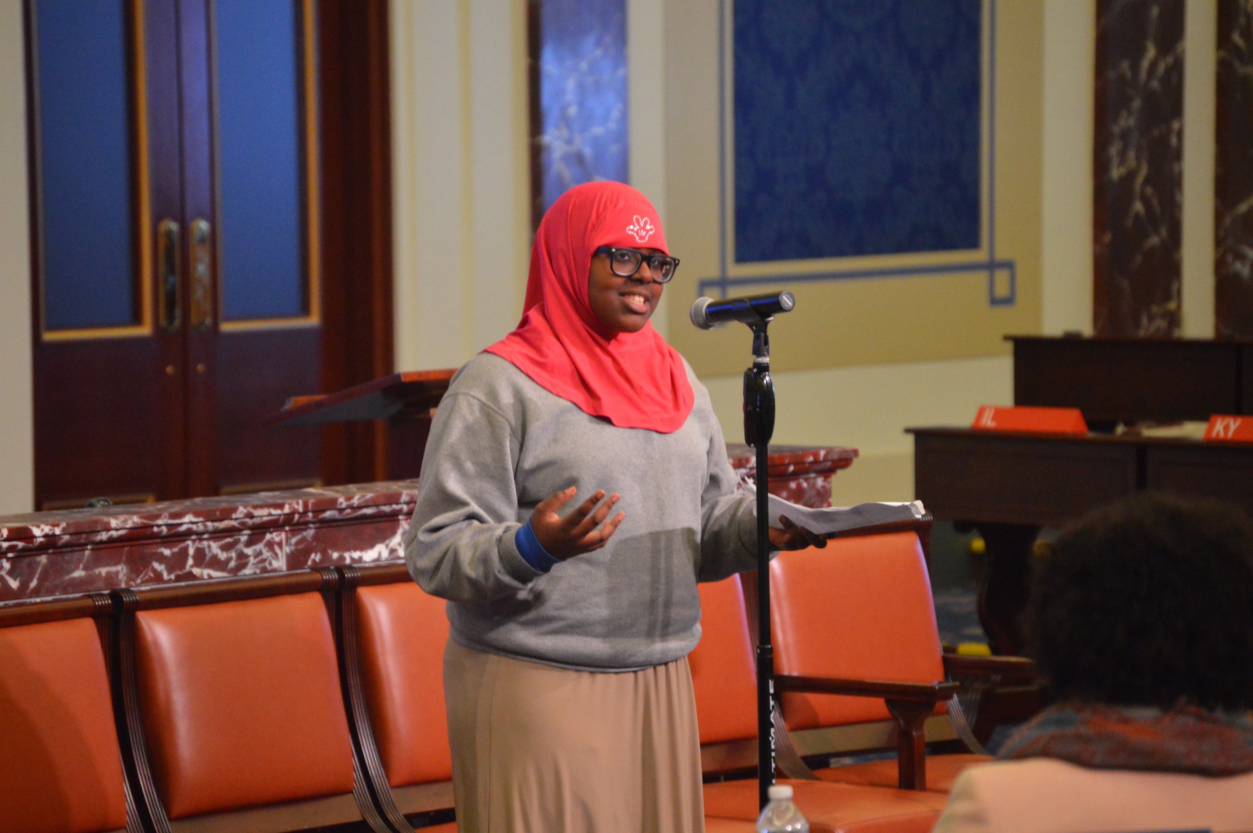 Ny’lasia Brown (L) and Sumeya Aden deliver their poems at "Speak Up! Art is Action" in October.