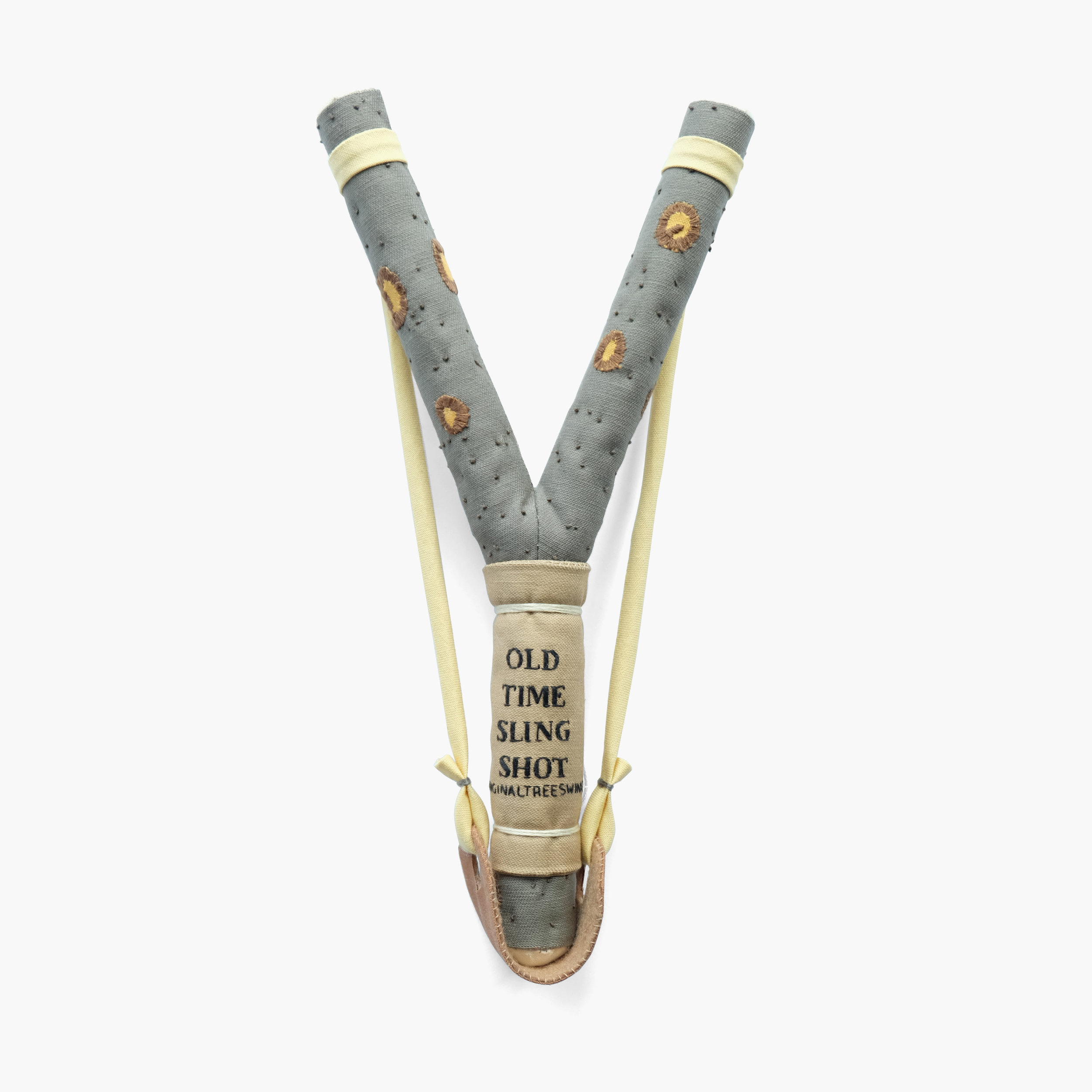 Nostalgia for a Youth We've Never Known Sling shot from The Original Tree Swing Hardwood dowel, foam, fiberfill, cotton cloth, embroidery floss 10 x 5 x 1 in 2015