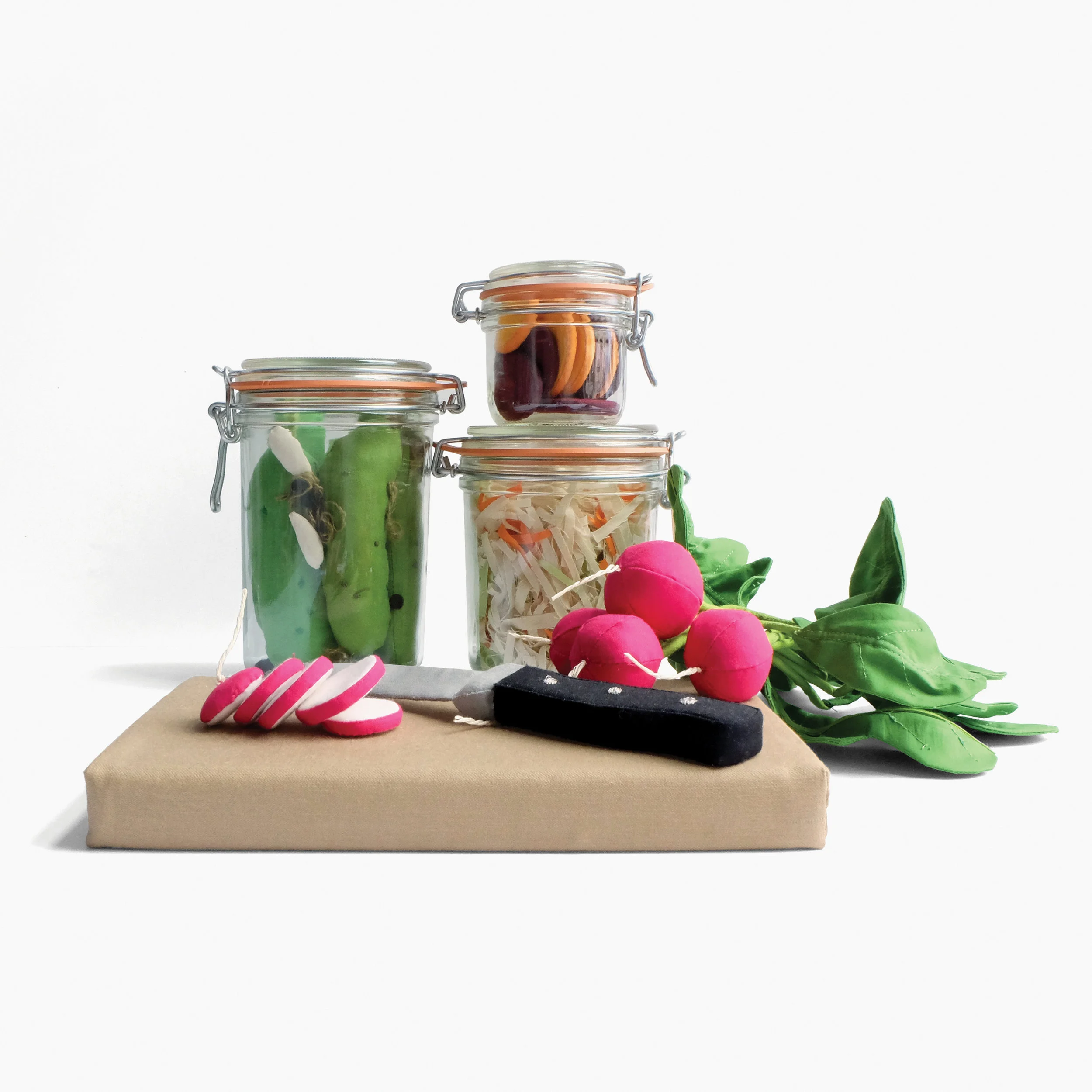 Pickled Probiotics Assorted vegetables, cutting board, and paring knife Foam, fiberfill, felt, armature wire, cotton cloth, embroidery floss, glass jars Approximately 9.5 x 12 x 12 in 2012–2014