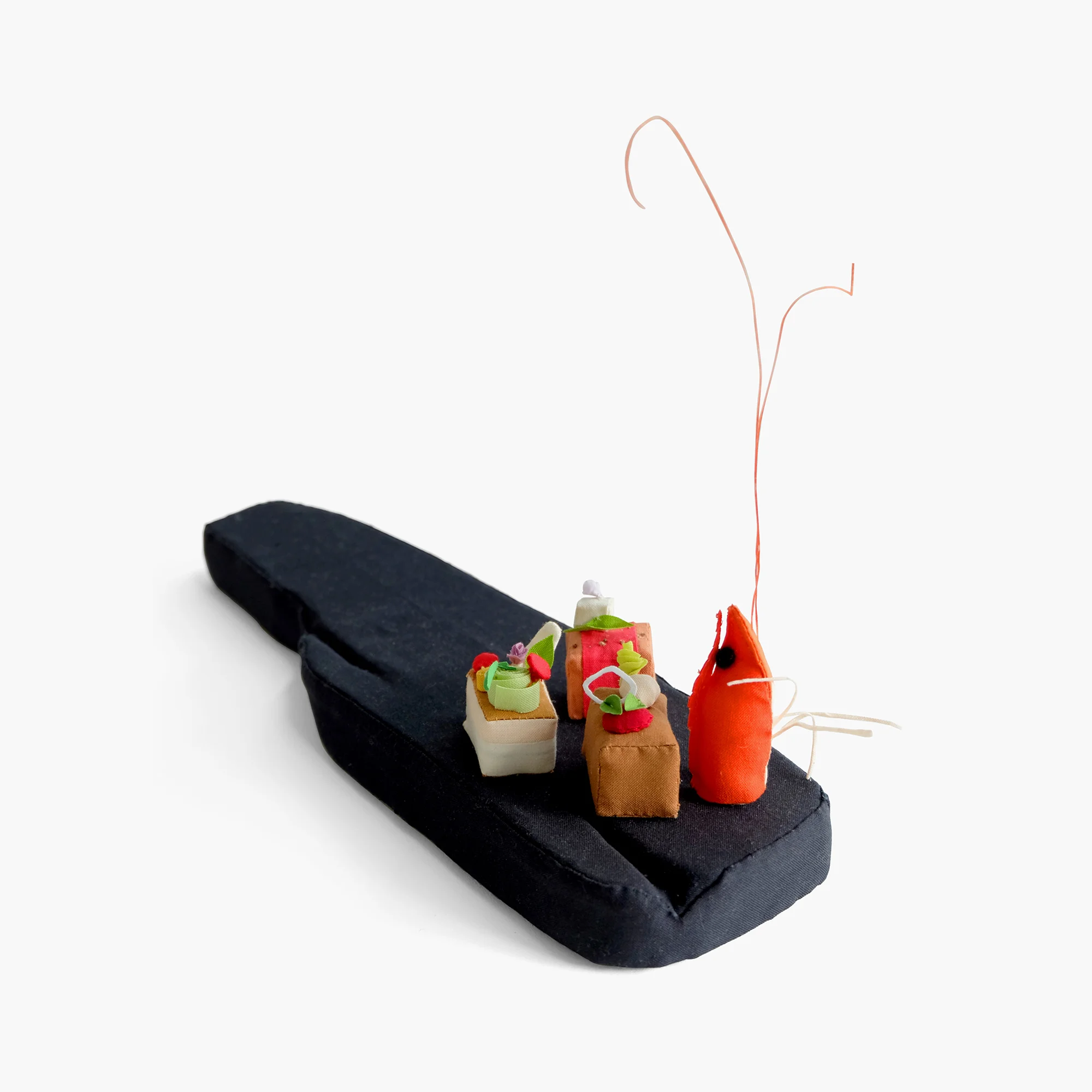 Art and Science "Binchotan, Tokyo Inspiration" from Alinea Foam, fiberfill, cotton cloth, pom pom, embroidery floss 9 x 13 x 3.5 in 2014