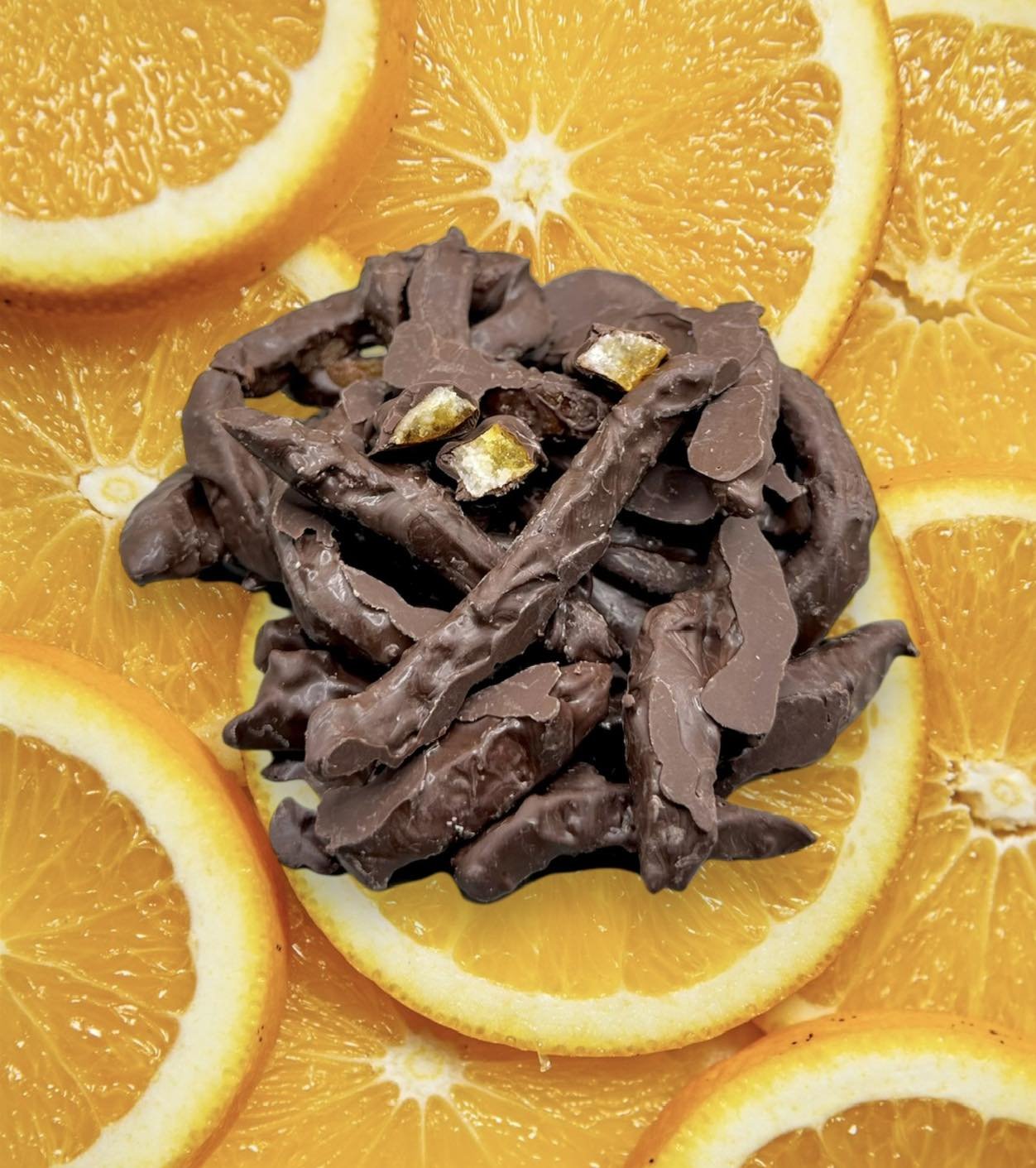 Make life zestier with some dark chocolate orange peels 🍊😋
.
.
.
#sweettooth #dessert #sweet #snacks #sweettreats #candyshop #candy #candystore #ssi #stsimonsisland #stsimons #handmade #homemade #georgia #gummyorangepeels  #darkchocolate