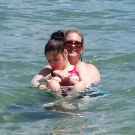 Sofia and Gwendolyne on the beach in Turks and Caico.