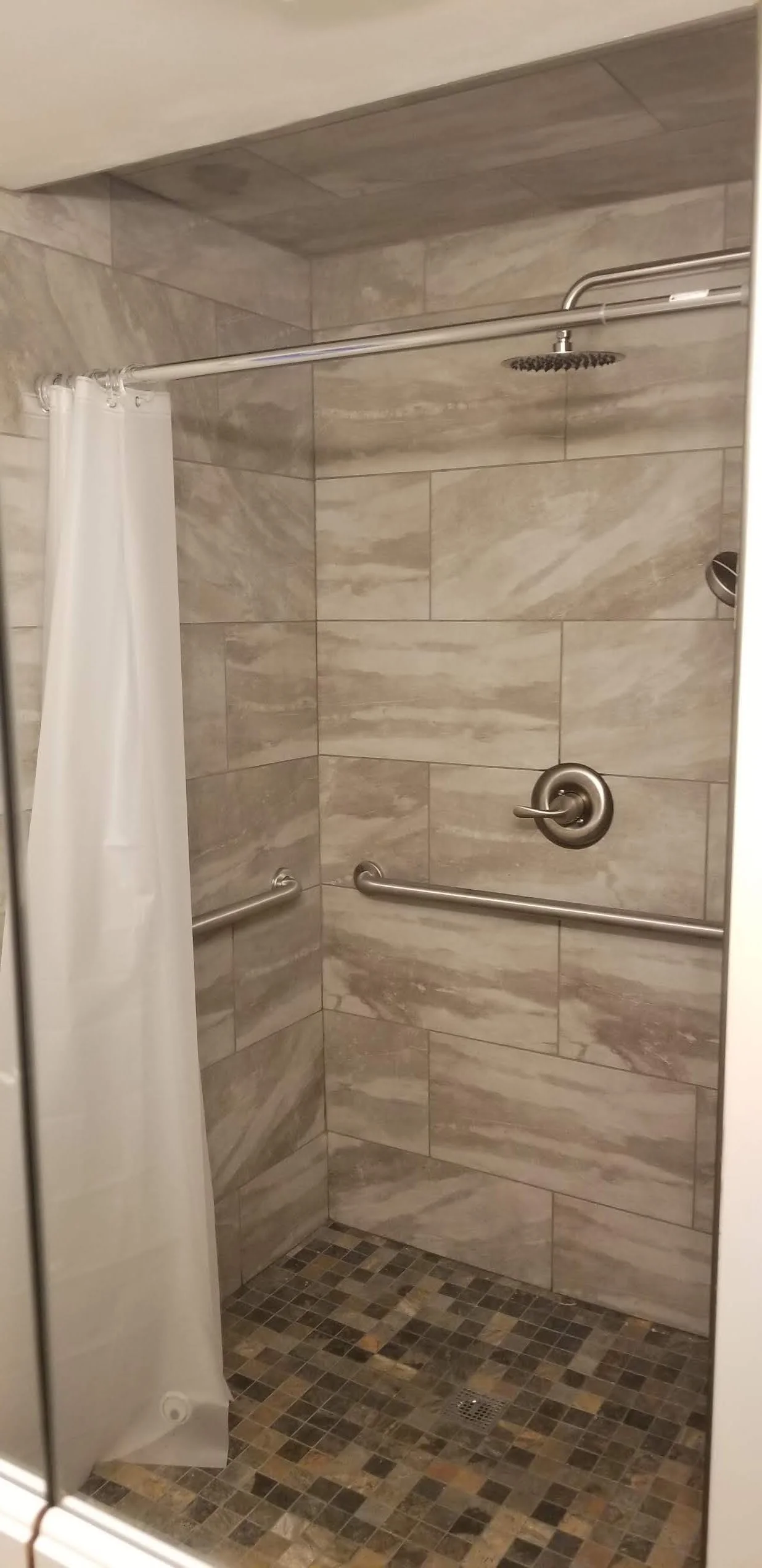 From a powder room to a fully wheelchair accessible roll in shower 🚿. Good job 👏 #BFAllc team !