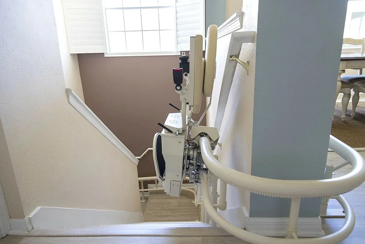 Harmar curved stair lift installation in Michigan home for safe aging in place accessibility
