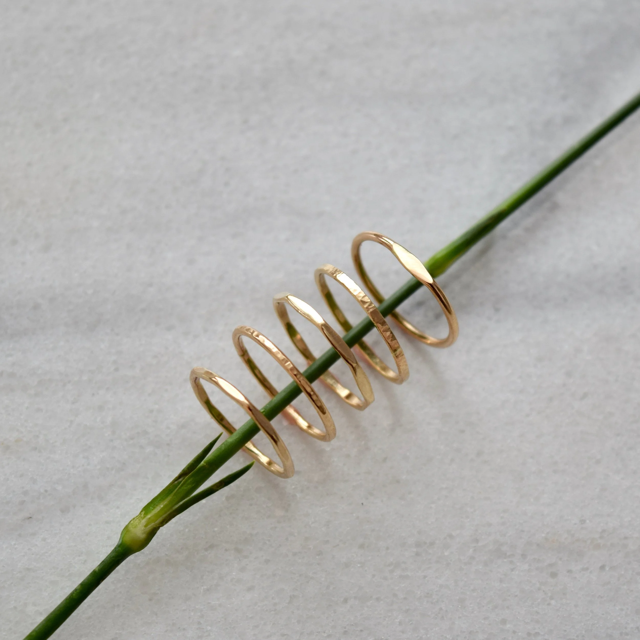 Pictured (L-R): Faceted Ring , Bark Band , Wide Faceted Ring , Wide Bark Band , Signet Ring