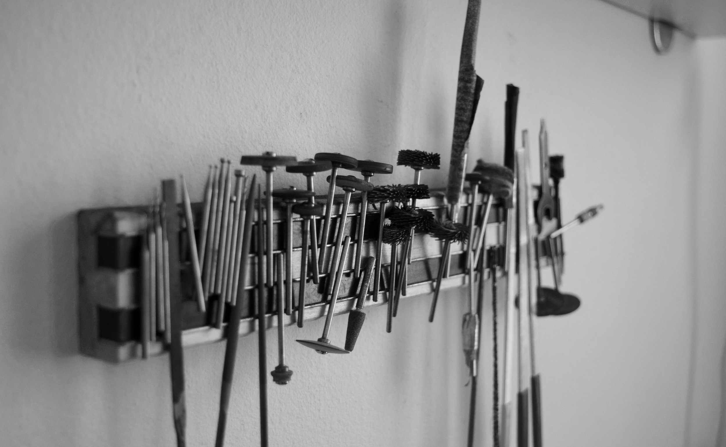 A closer look at our tool bar, filled with different tools for polishing and drilling. Each of our jewelry piece comes into contact with at least a third of them!