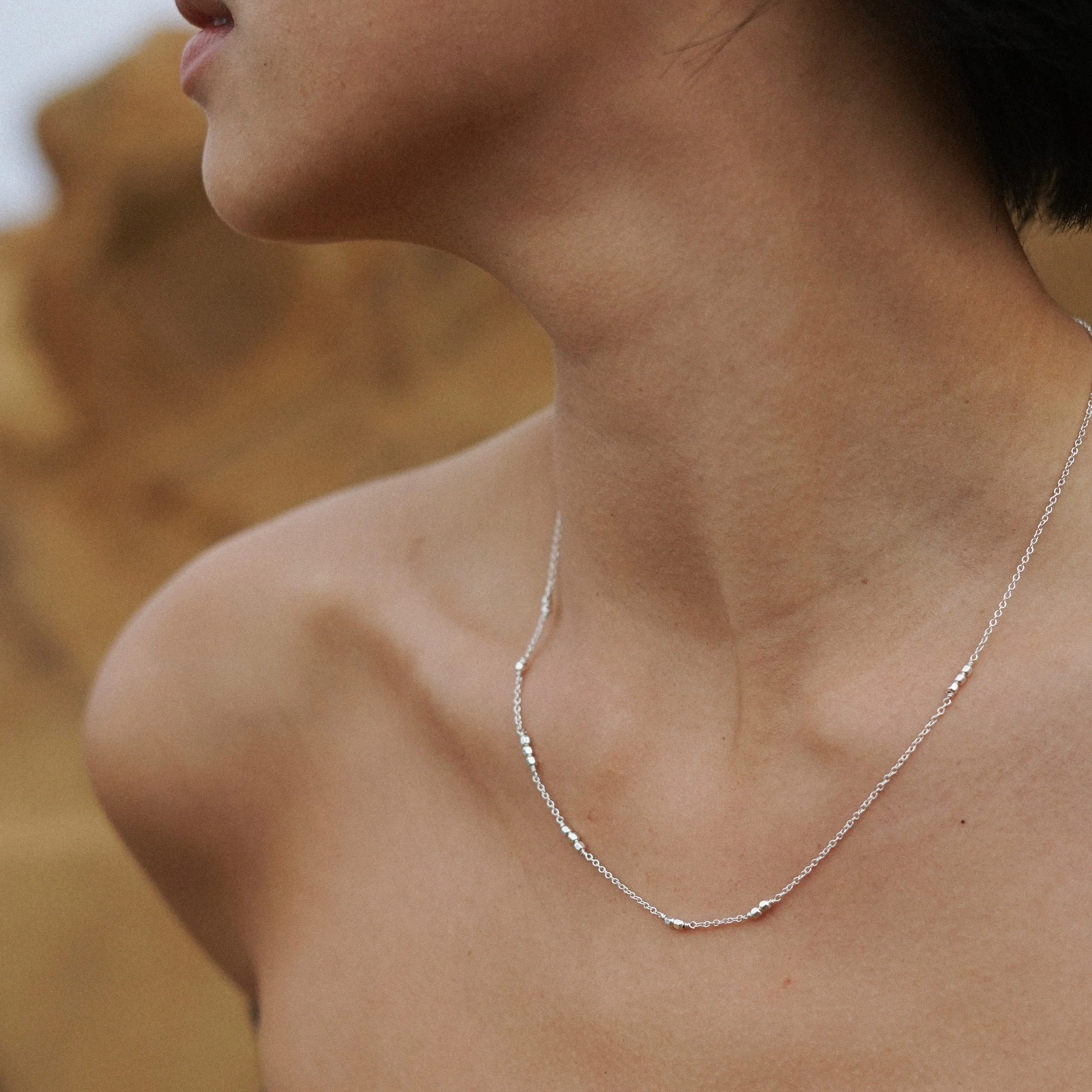 A subtle Morse code necklace that lets you encode your secret name, word or message. Featuring hand-strung dots and chain dashes, it’s versatile to style and ultra layerable.