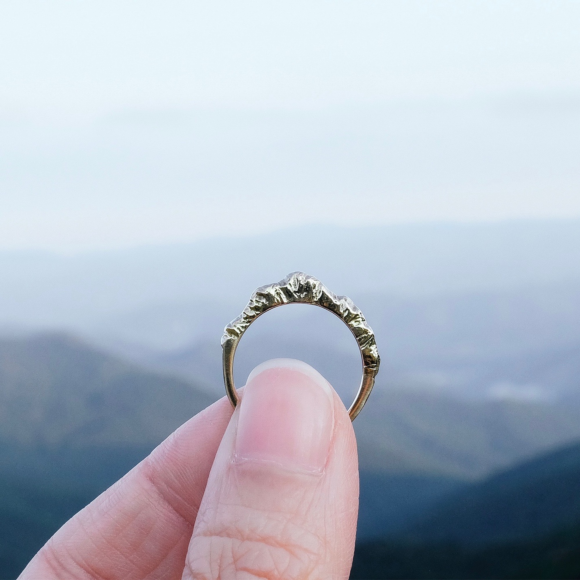 A mountain ring in gold or silver, with peaks & valleys atop a delicate shank. A daily reminder to keep chasing your dreams. See our mountain jewelry collection at www.everlijewelry.com/mountains