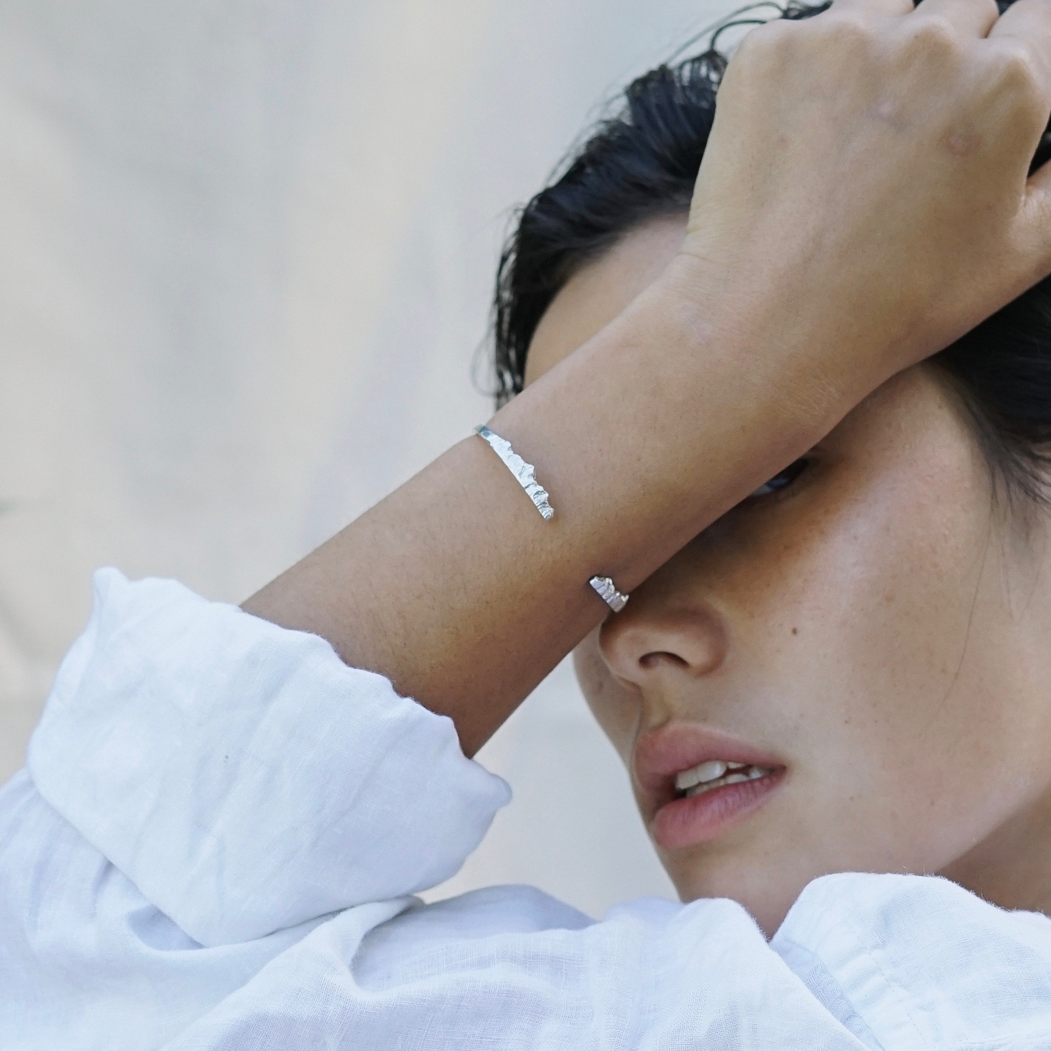 A sleek mountain bracelet cuff that ends with textured peaks and valleys. Wear it as a reminder to enjoy every step of your journey. View our mountain jewelry at www.everlijewelry.com/mountains