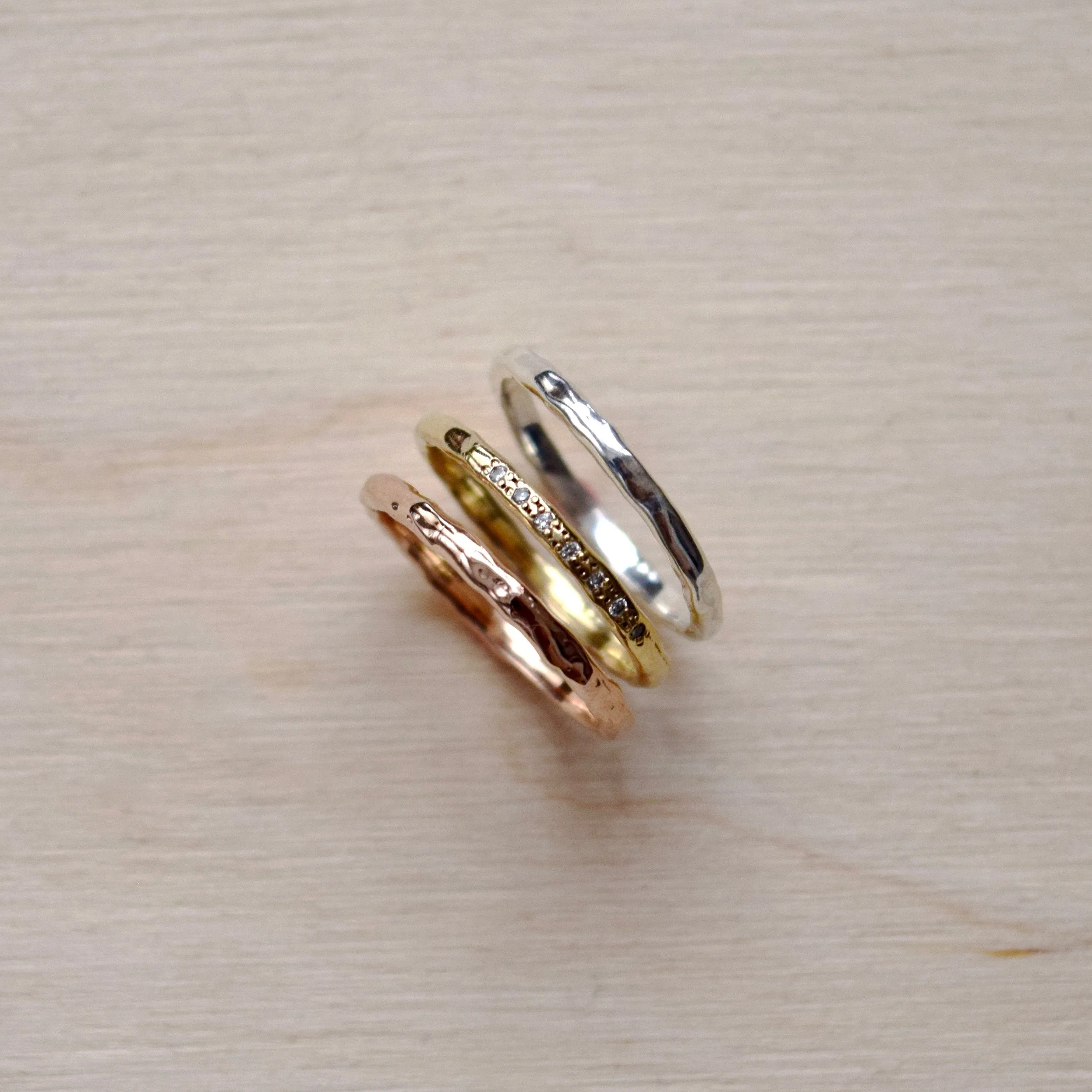 A simple ring imprinted with the quiet texture of water ripples. A reminder that change is life’s constant and it’s when we let go that we set ourselves free.