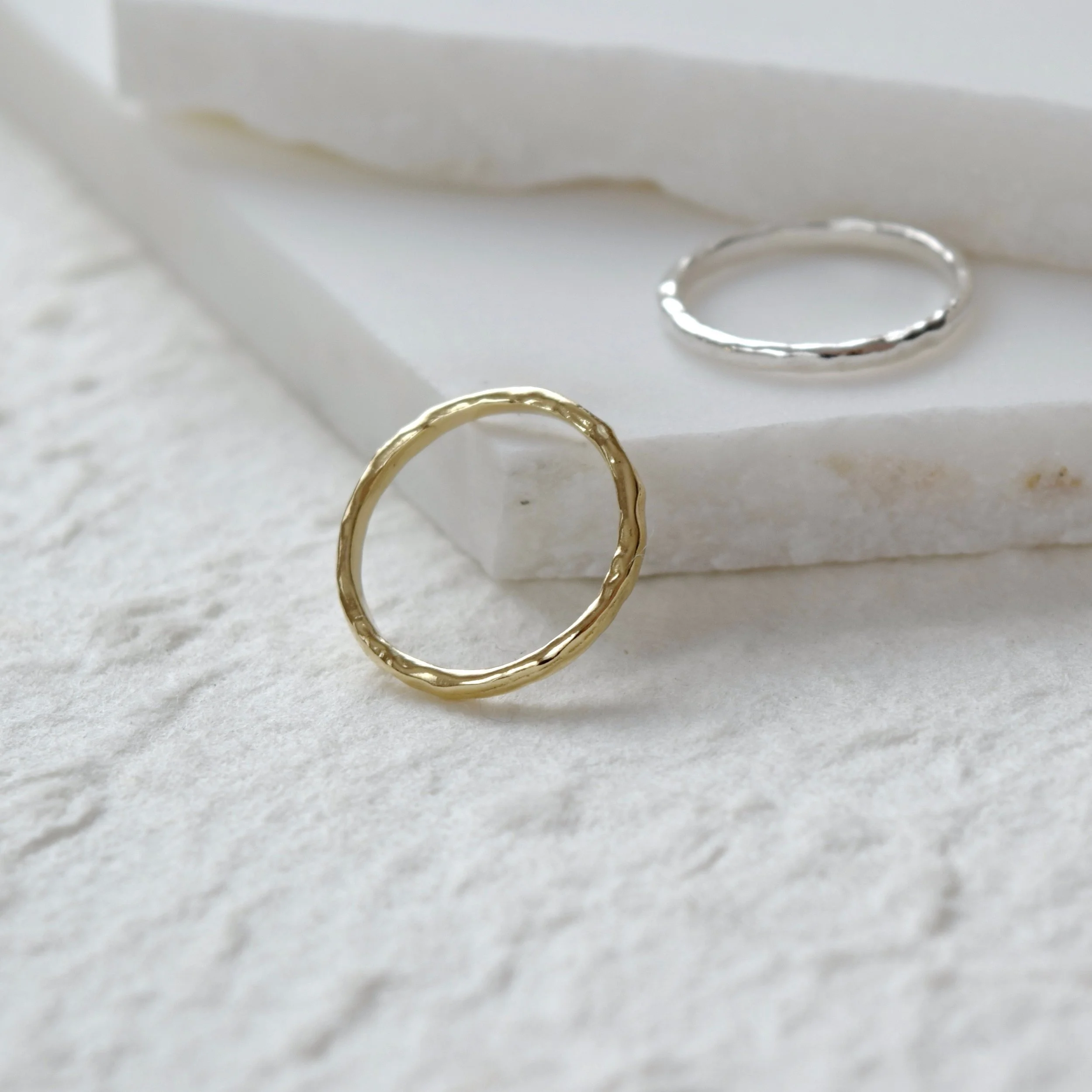 A simple ring imprinted with the quiet texture of water ripples. A reminder that change is life’s constant and it’s when we let go that we set ourselves free.