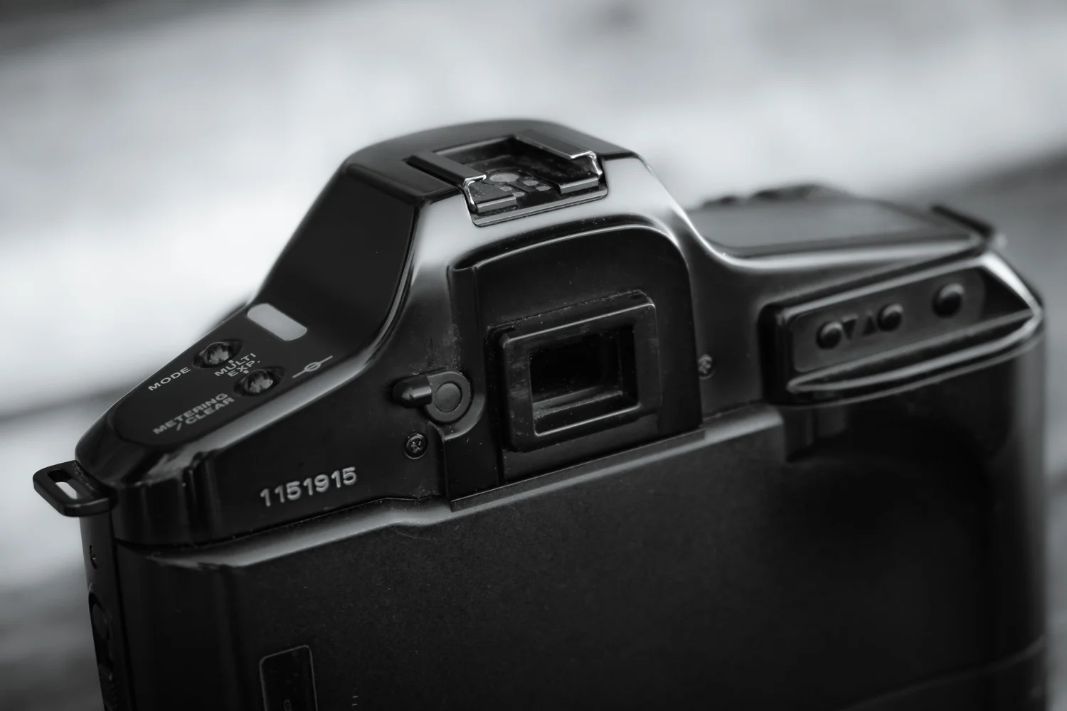 This example is missing the rubber eyecup, a piece which would frequently come loose and get lost