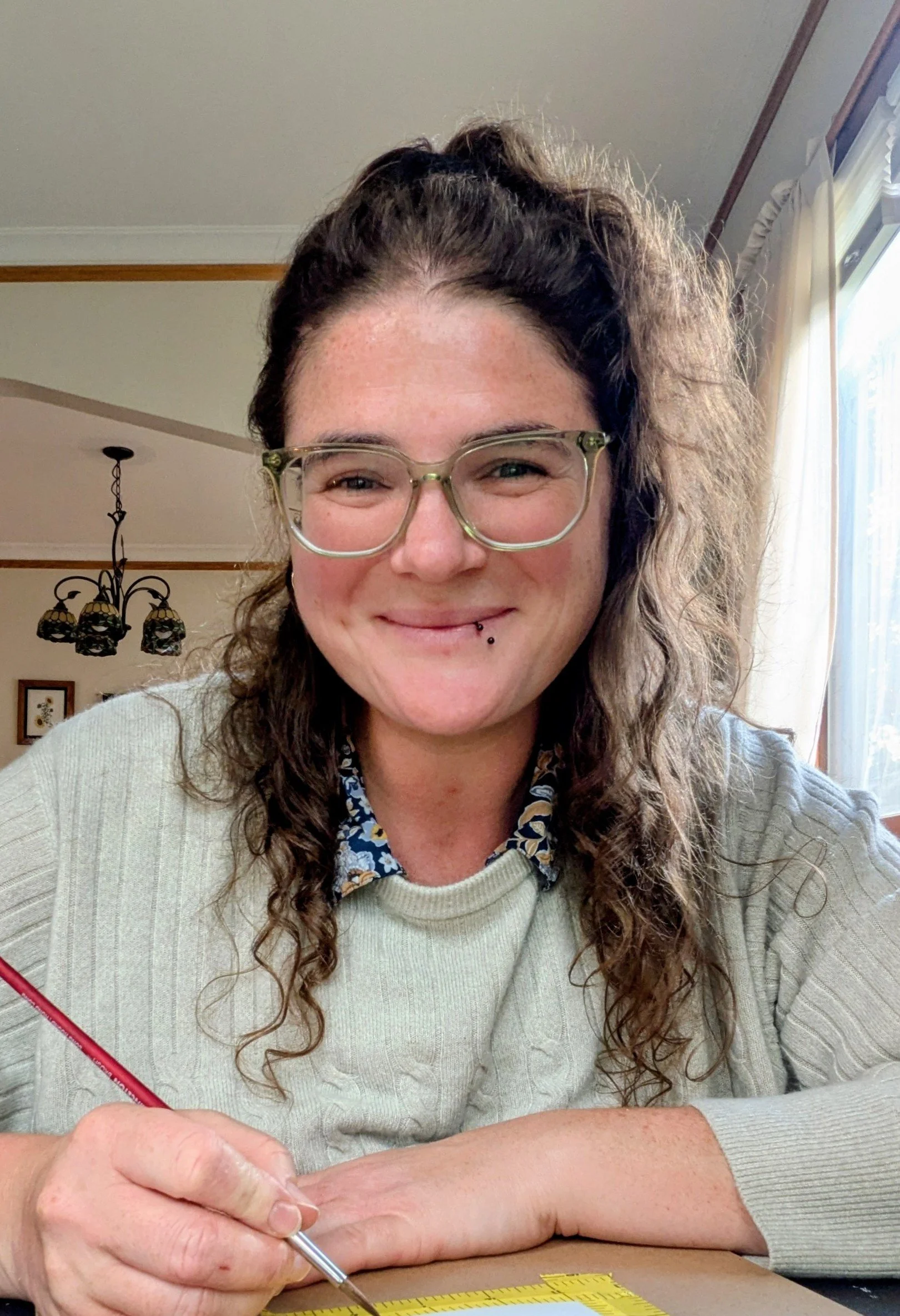 Cropped 2025 Headshot Caroline Porter (1).jpg