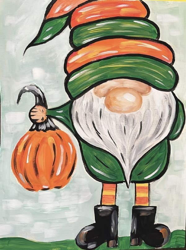 Image of a gnome holding a pumpkin