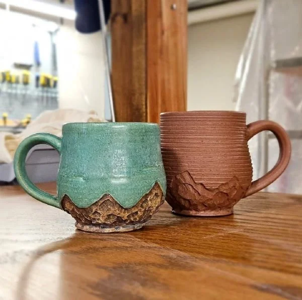 Image of two glazed ceramic mugs
