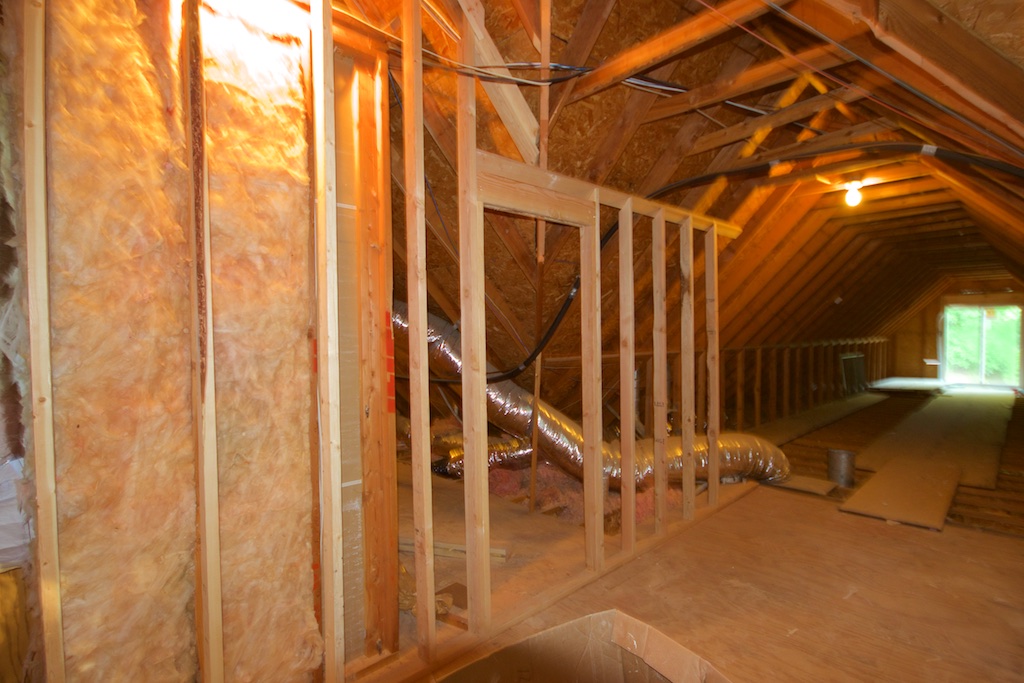 I'm in the attic space here, looking north-northwest. They have started framing out a new wall and storage area that will be just before the entrance into the studio. This will be studio storage. Because, of course, the studio area of 34' x 12' could not possibly be enough, right? I have so much stuff! Directly opposite this new wall, on the east side, will be the new kitchenette and bathroom. They have to raise the roof, literally, for the kitchen and bath. Can't wait to see that come about!