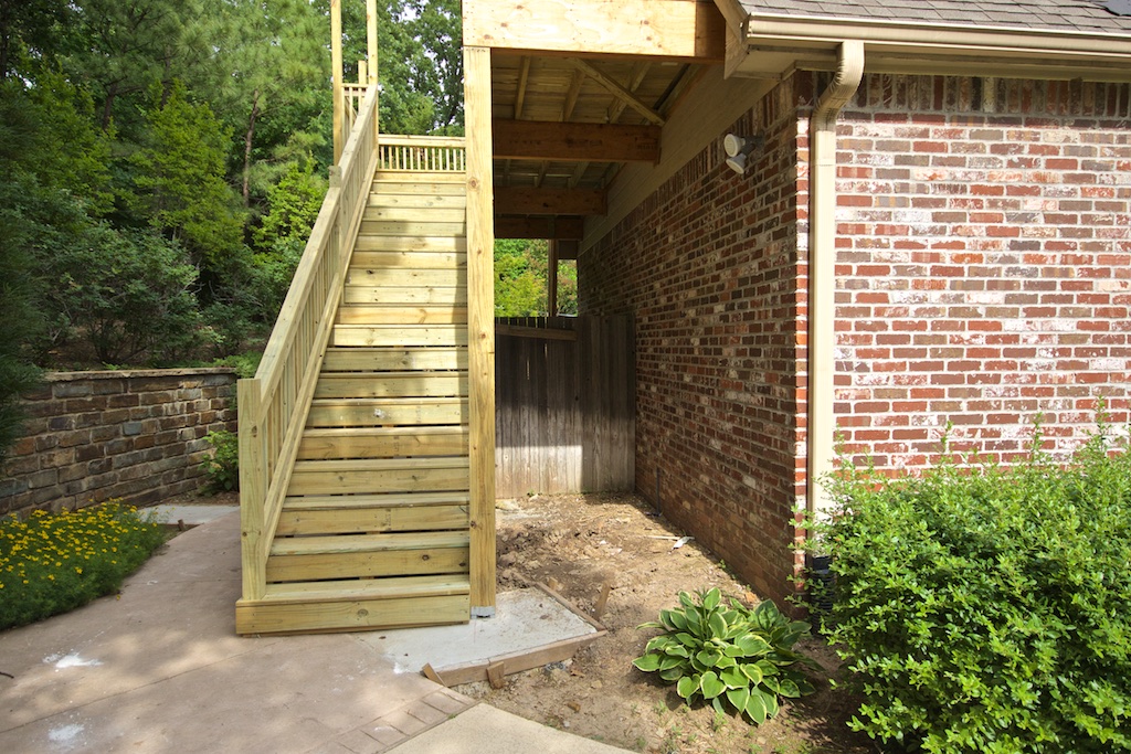 New shade garden area under the deck and stairs. It gets just a bit of late afternoon sun.