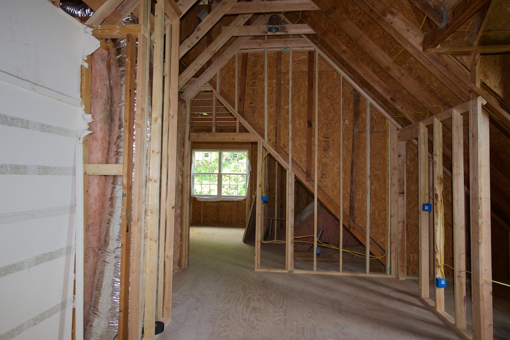At the entry to the studio wing. I decided to move the doorway in further—pretty much straight ahead, instead of where I am standing. This will be an interesting area and I did not want doors swinging around in it.
