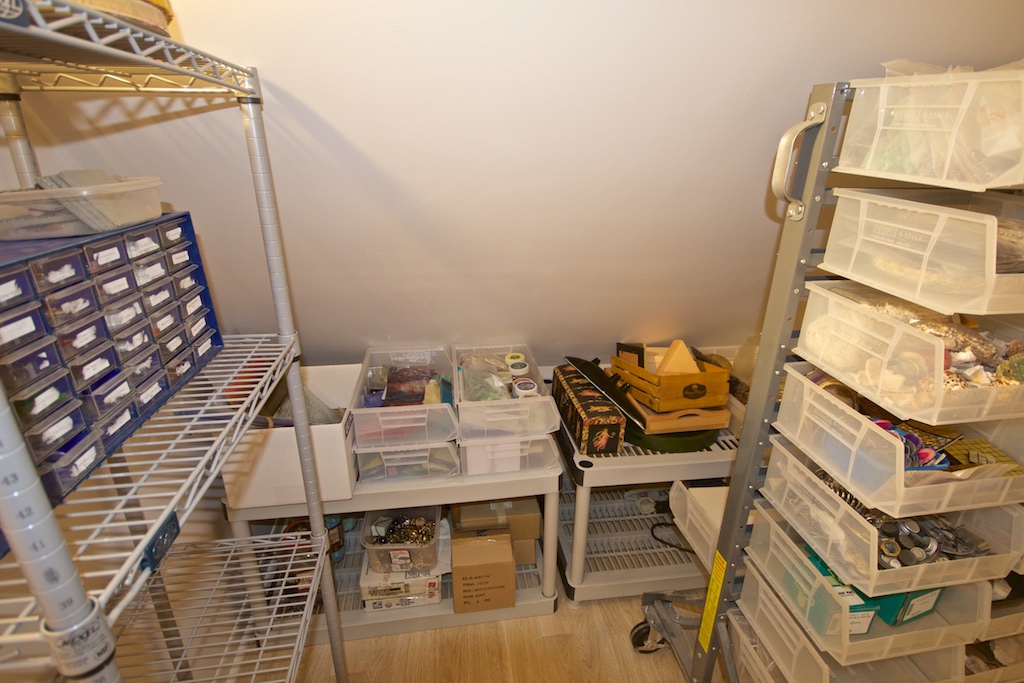  Inside the closet. I used parts of shelving to maximize storage along the low, angled wall. 