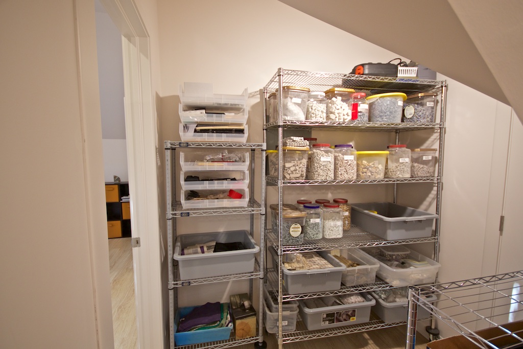 Inside the closet, standing in the little substrate nook.