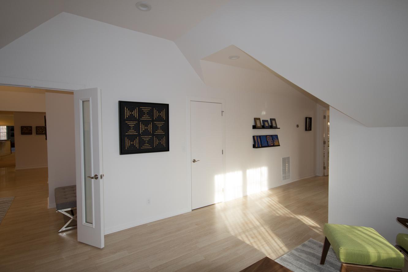 From in front of the double window, with studio to the right.
