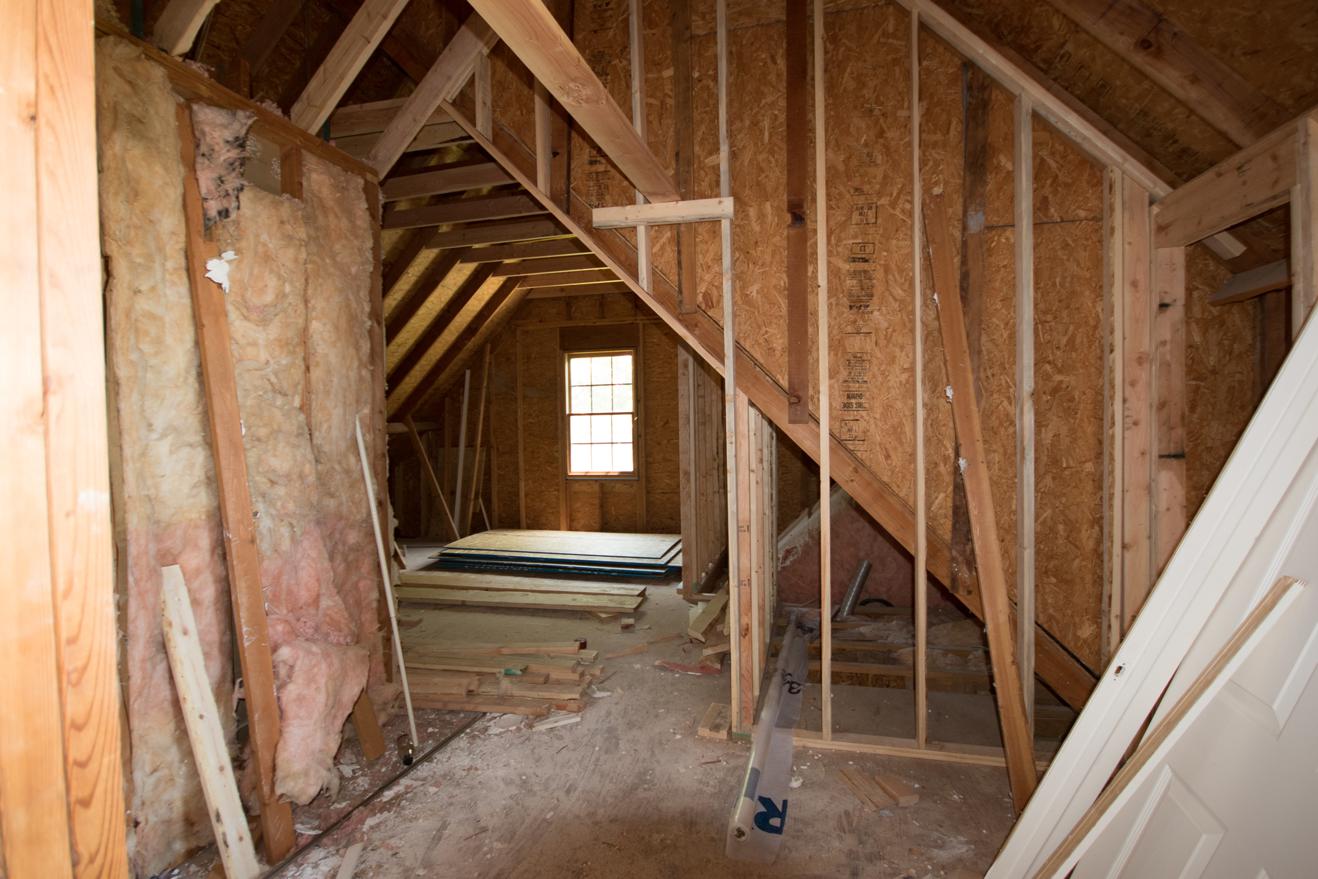 Construction has just begun: At the attic doorway, looking into the unfinished attic space.