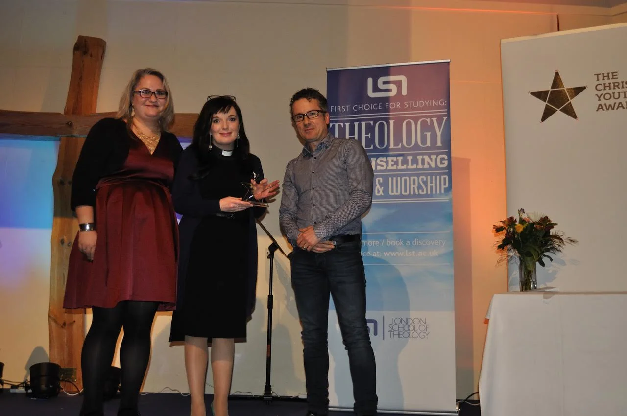 Gemma Dunning and Revd Sally Hitchiner from Diverse Church receiving their award from Robin Barden