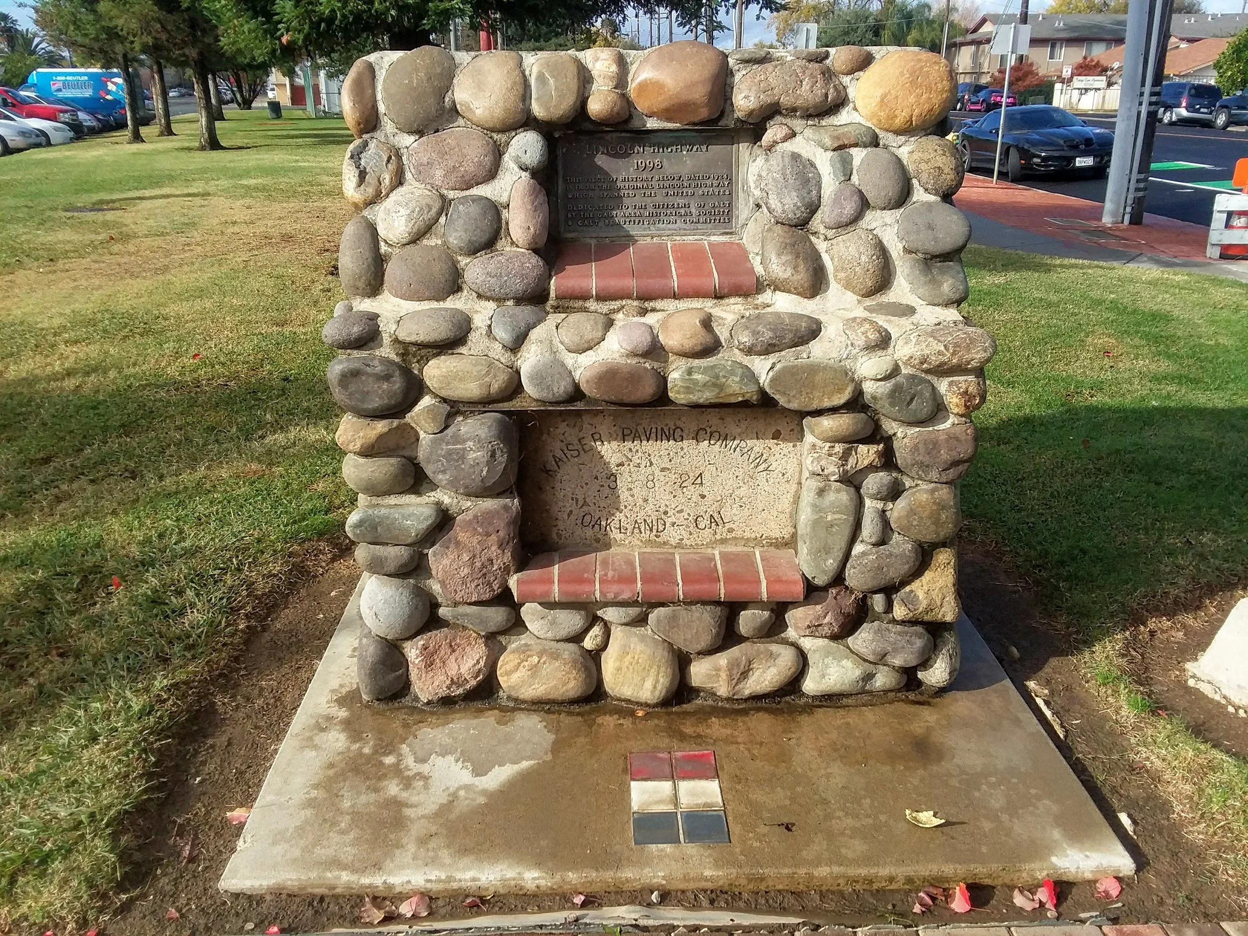 Lincoln Highway monument, Galt, CA. Notice the piece of Lincoln Highway concrete with the contractors name and date on the bottom.