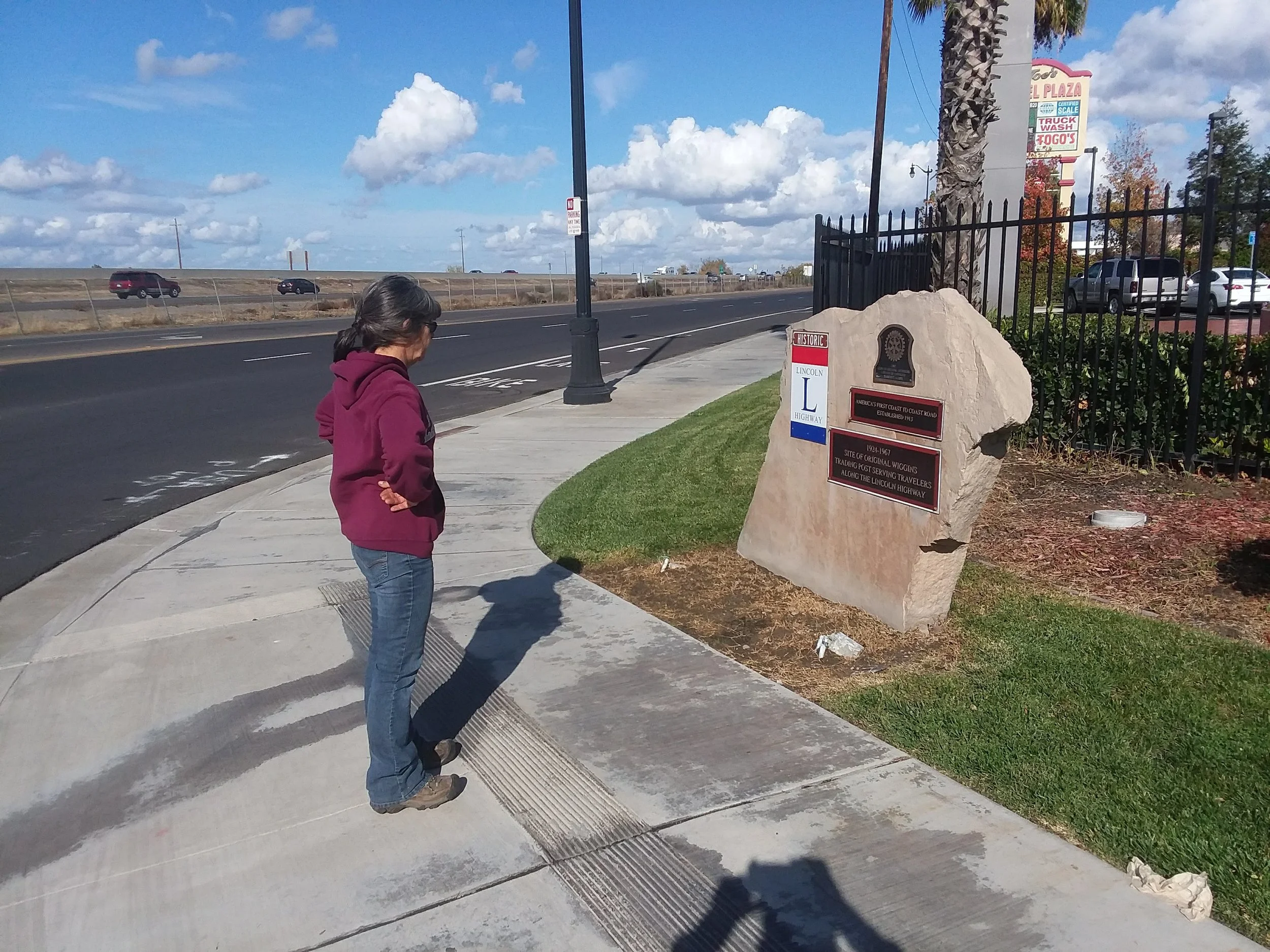 Monica checking out the monument at Wiggins Trading Post site, Lathrop, CA.