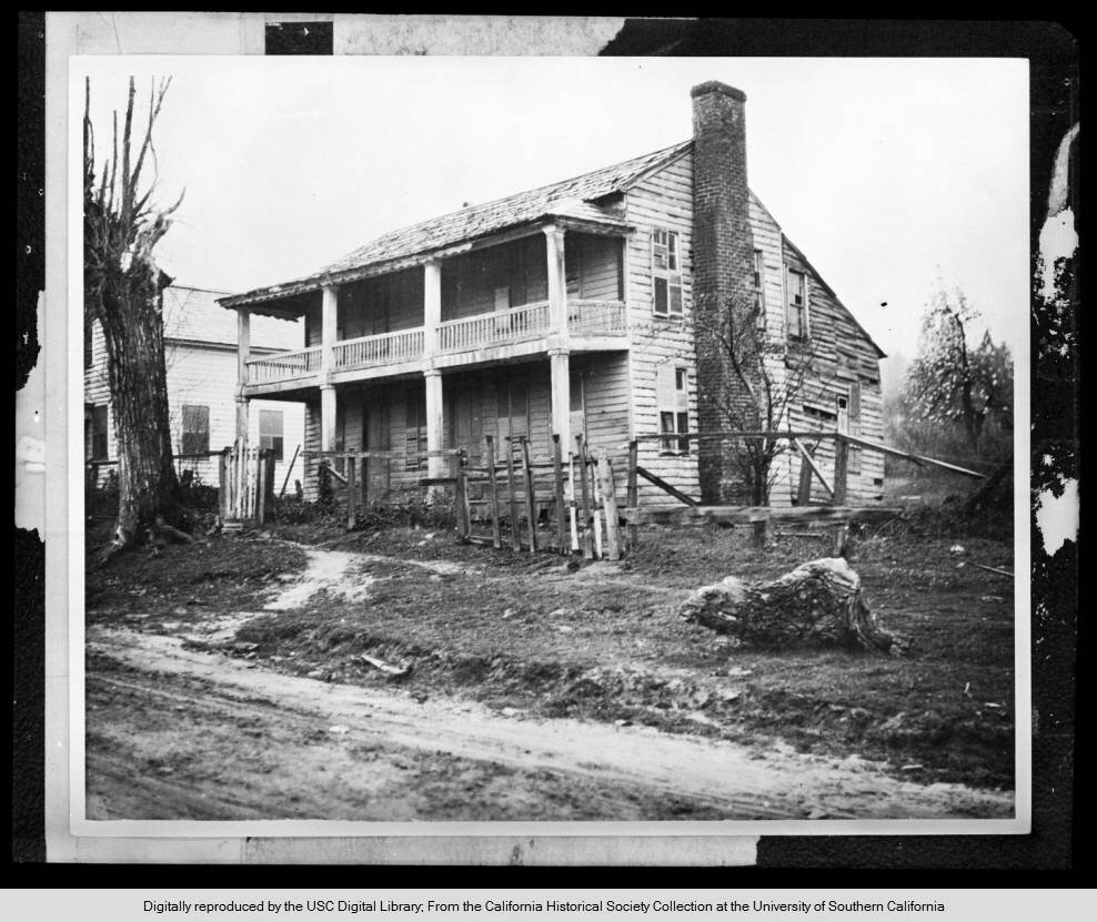 Exterior view of the old home of T. Robertson in disrepair, ca.1930