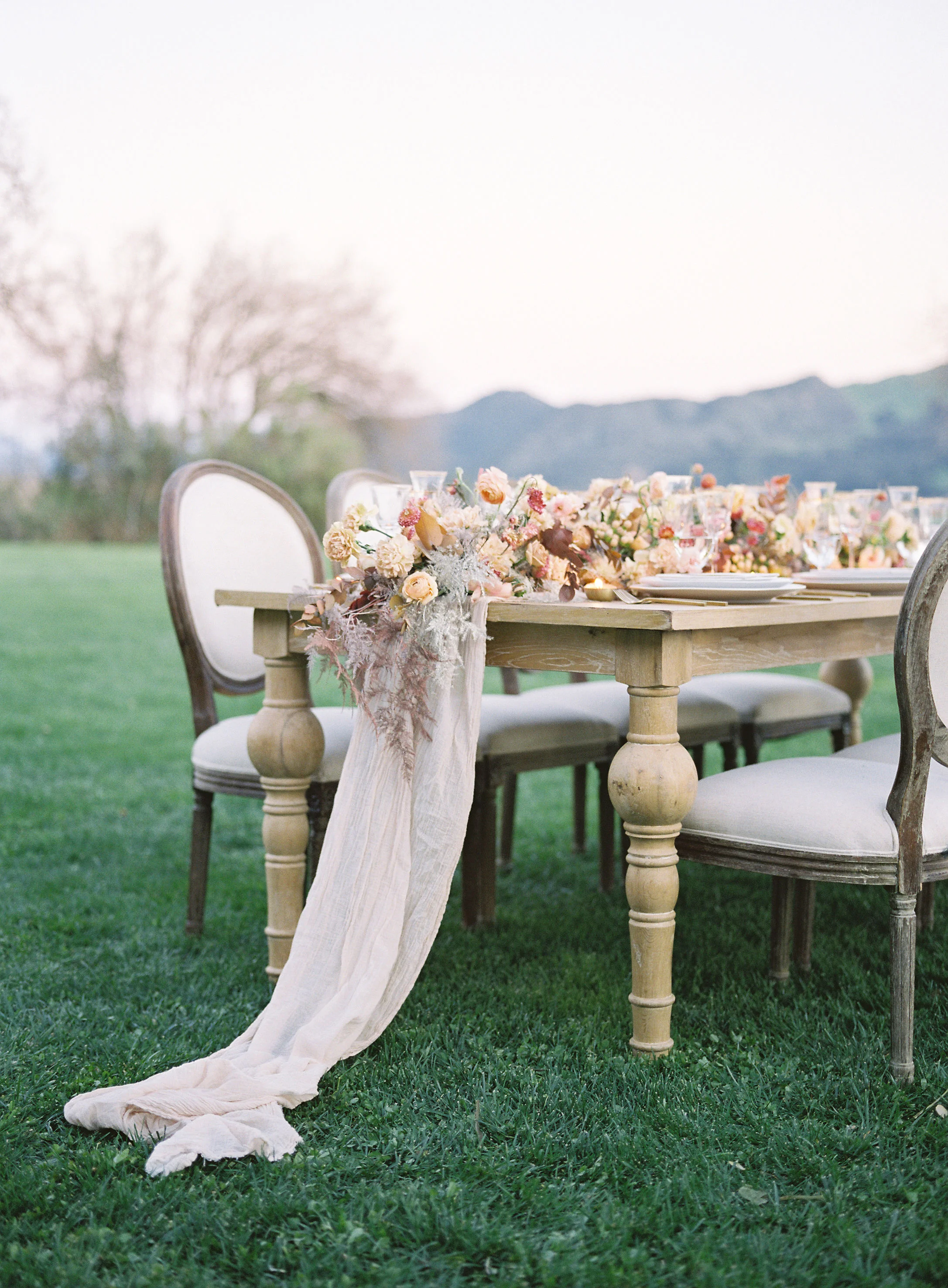 jessica-zimmerman-events-sunstone-reception-linen-table-arrangement.jpg