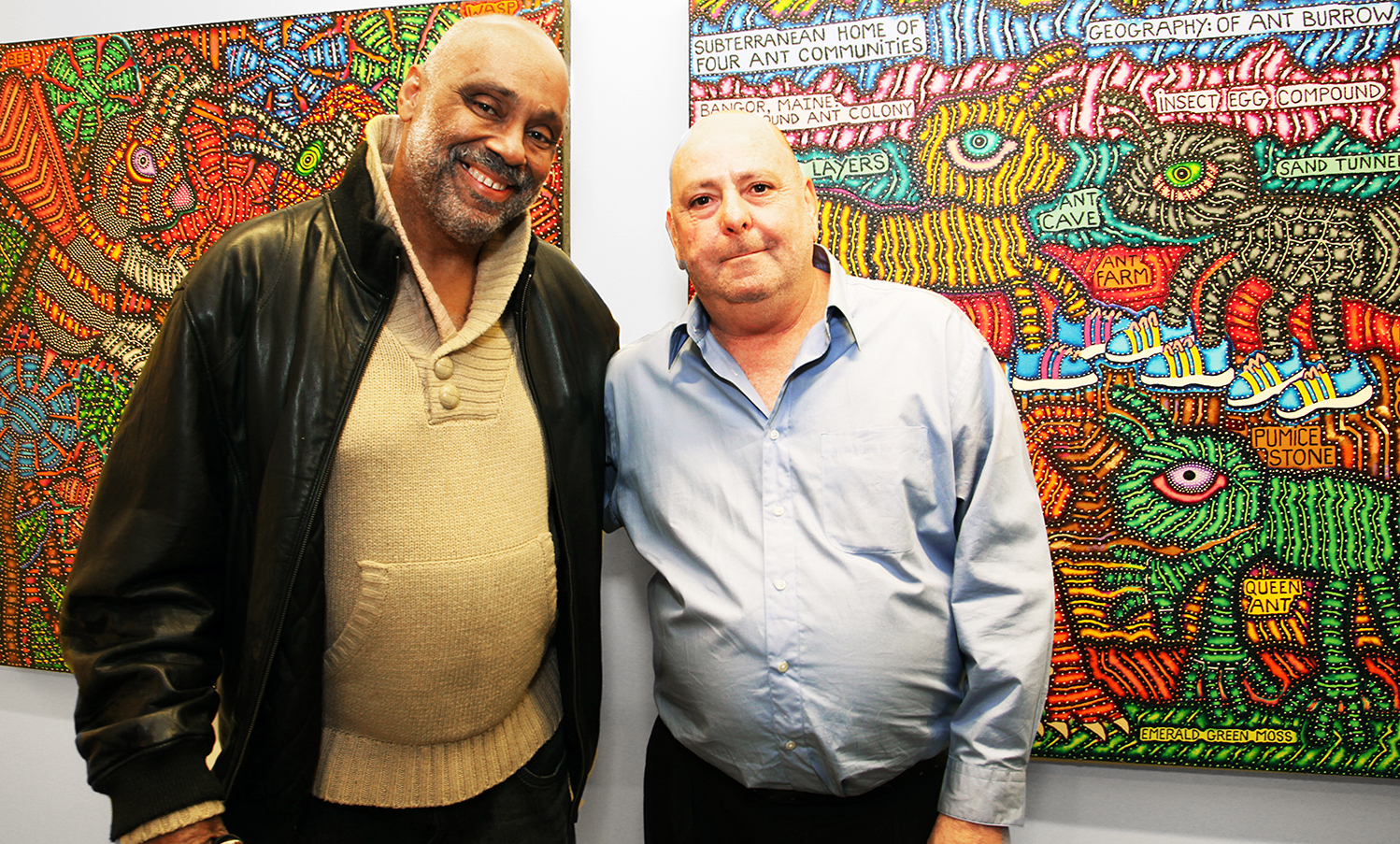 Artist, Danny Simmons and Odyssey House client, Jack Cooperman in front of Jack's work at the Art Project's 10th anniversary exhibition at Siegel+Gale.