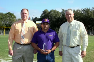 MVP Ruben Olivares With Superintendent Richard Grill and Director of Special Programs Michael Neuman