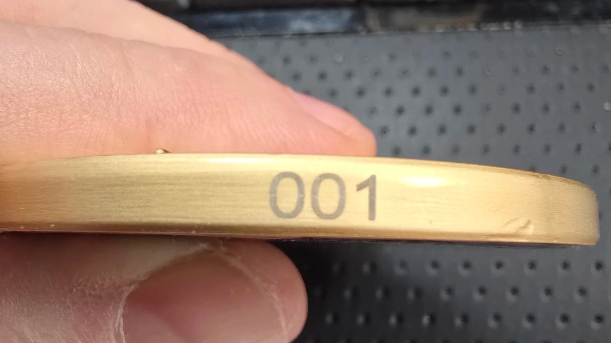 Laser engraved number 001. Everyone get's coin number 1