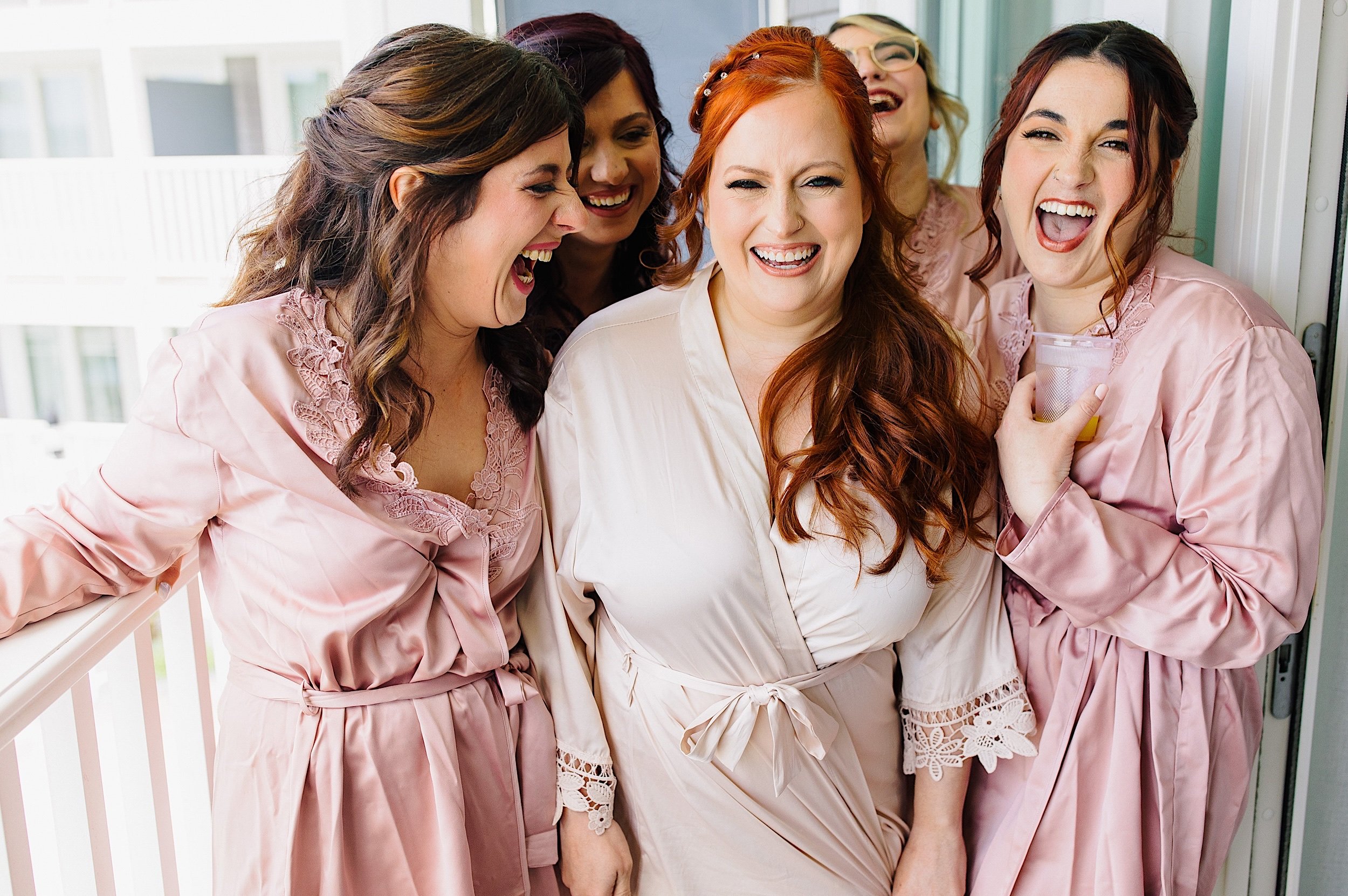 013-Florida-bride-laughing-with-bridesmaids.jpg