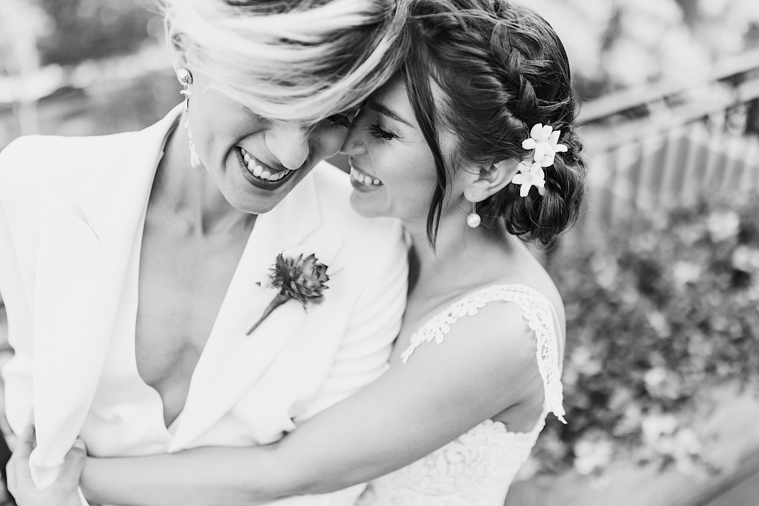 021-ZacWolfPhotography-20220521-Blog_Two-brides-hugging.jpg