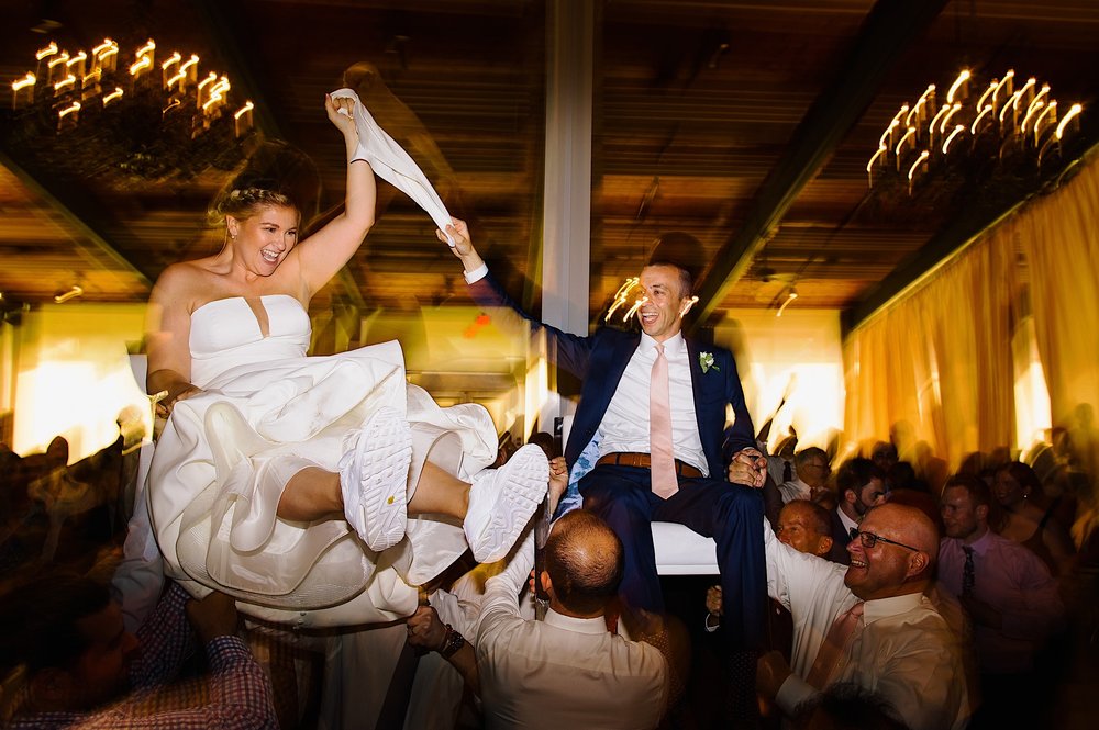 028-ZacWolfPhotography-20220522-Blog_Bride-and-groom-hora-at-Orlando-wedding-reception.jpg