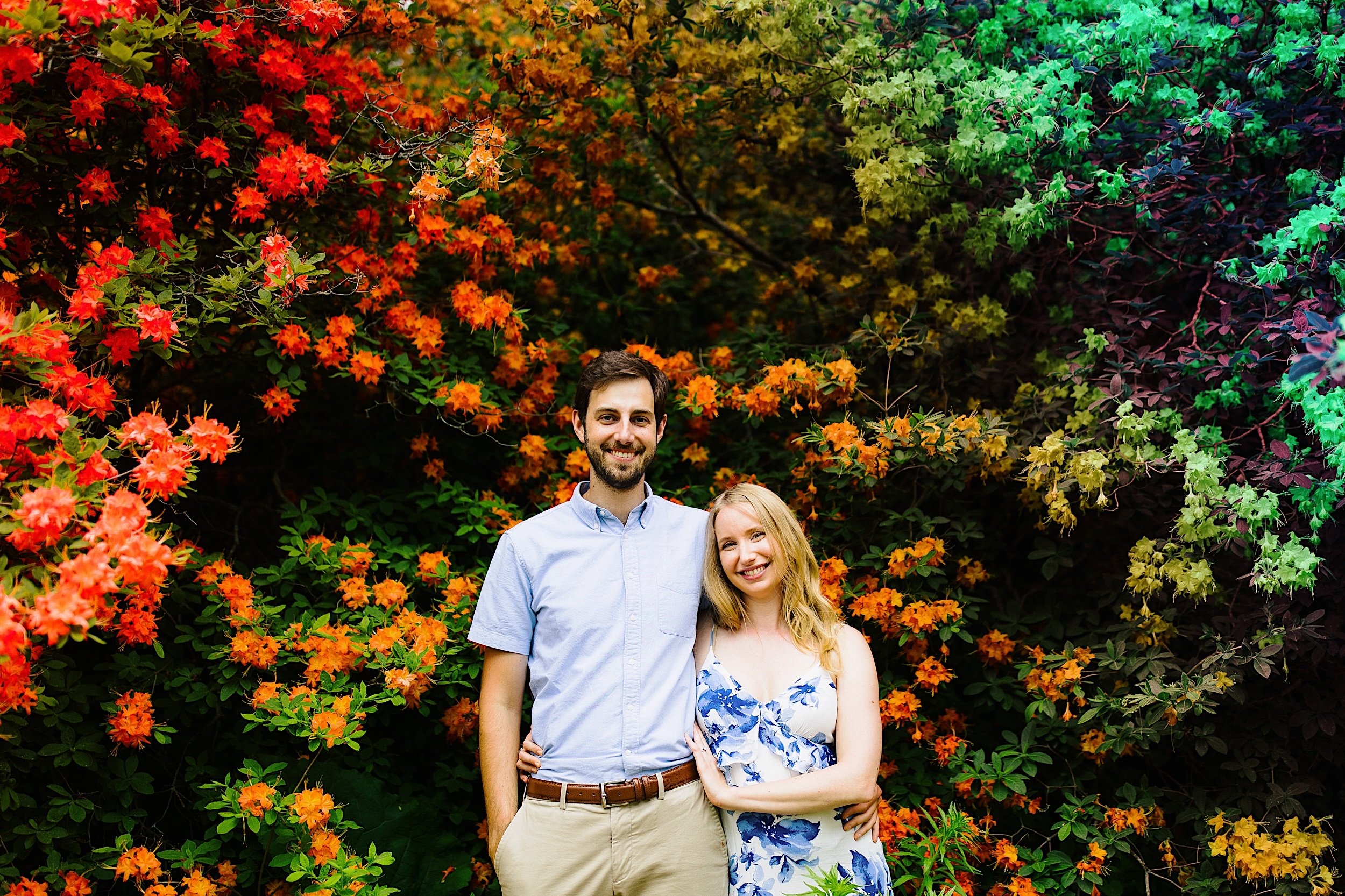 031-ZacWolfPhotography-20220607-Blog_Portrait-of-couple-in-Orlando-in-front-of-flowers.jpg