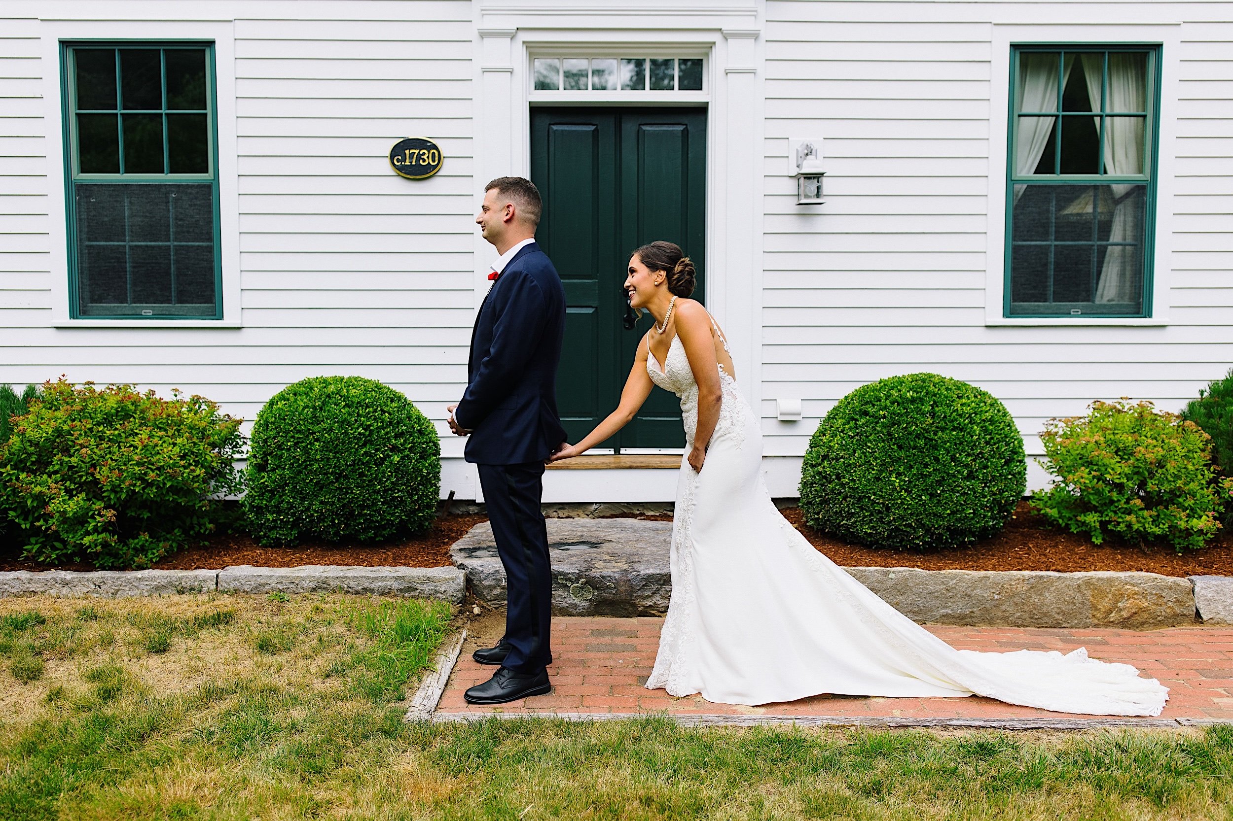 042-ZacWolfPhotography-20220702-Blog_Bride-and-Groom-first-look-moment.jpg