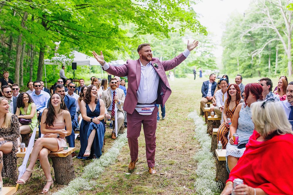 044-ZacWolfPhotography-20220702-Blog_Flower-man-at-wedding-ceremony.jpg