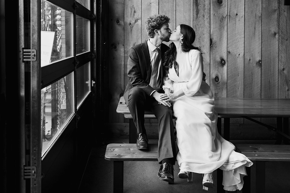 069-ZacWolfPhotography-20220904-Blog_Bride-and-Groom-kissing-at-florida-wedding-reception.jpg