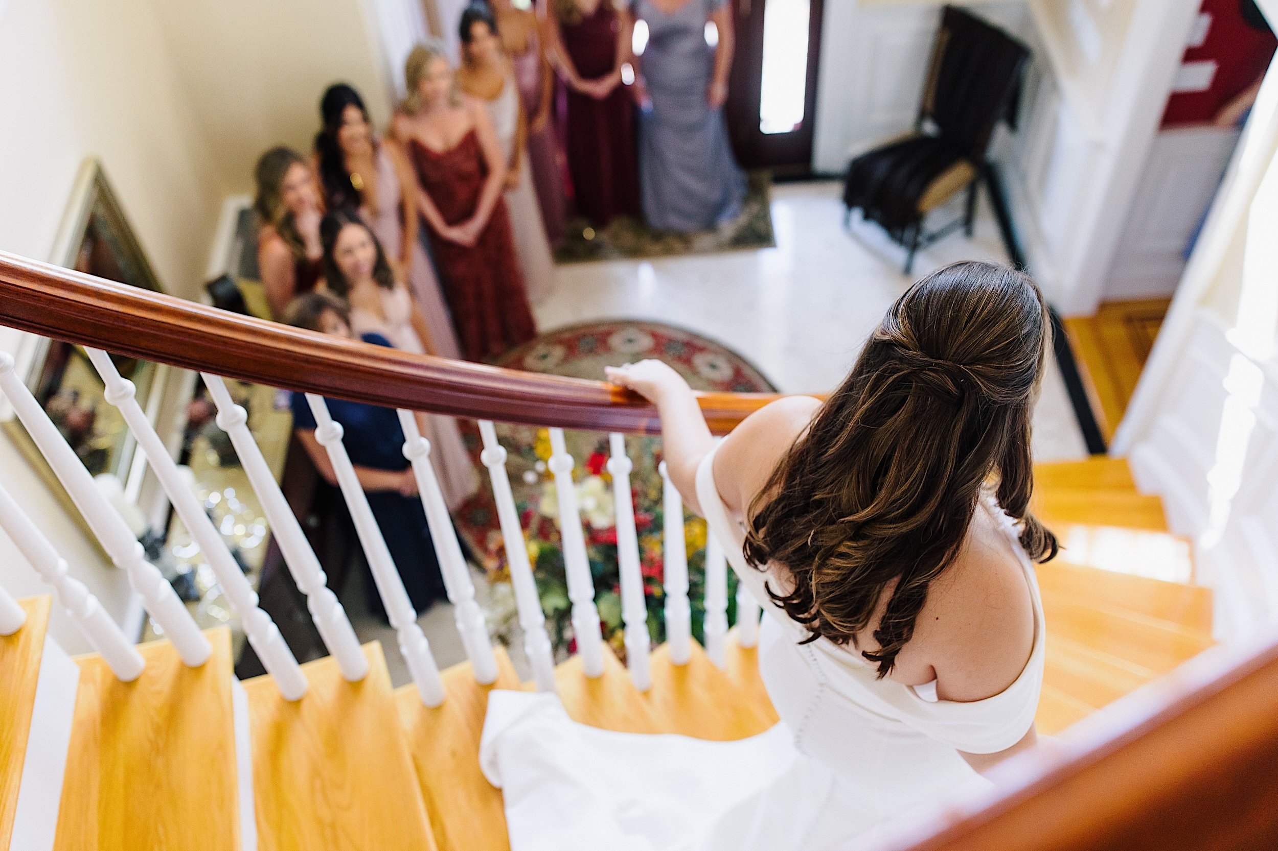 070-ZacWolfPhotography-20220910-Blog_bride-coming-down-stairs.jpg