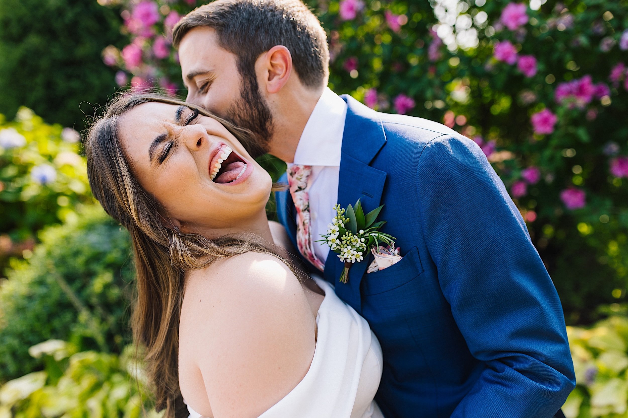 071-ZacWolfPhotography-20220910-Blog_Bride-and-Groom-laughing.jpg