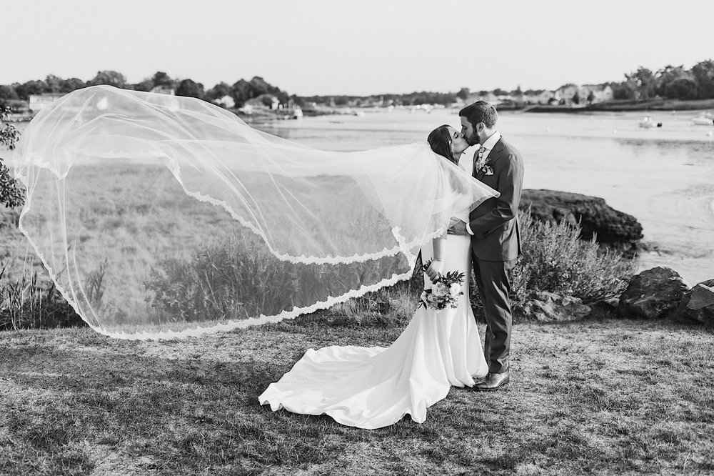 074-ZacWolfPhotography-20220910-Blog_Bride-and-Groom-with-blowing-veil.jpg