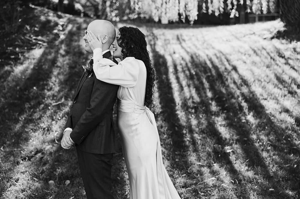 105-ZacWolfPhotography-20221029-Blog_candid-moment-of-Bride-and-Groom.jpg