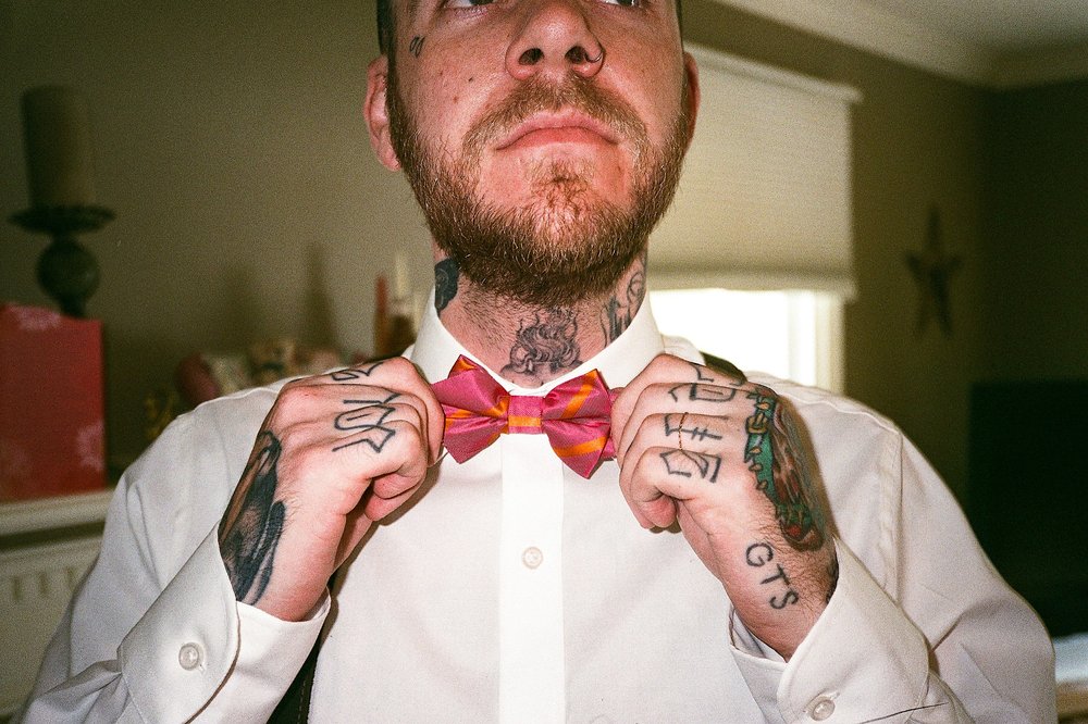 Scan33_Heavily tattooed groom getting ready for wedding.jpg