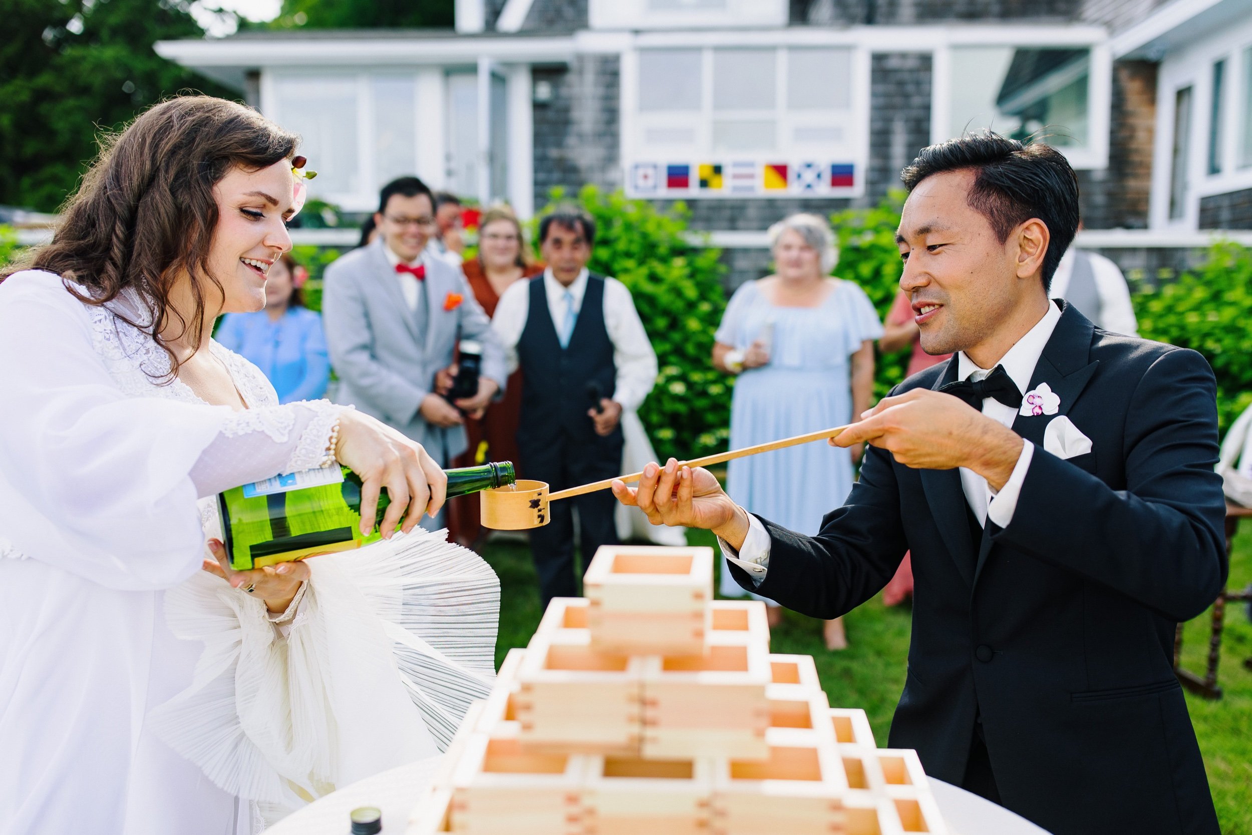 13_Orlando Bride and Groom Sake pouring.jpg