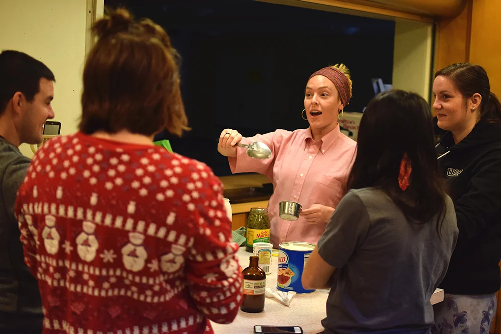 Bridget teaching how to make tamales