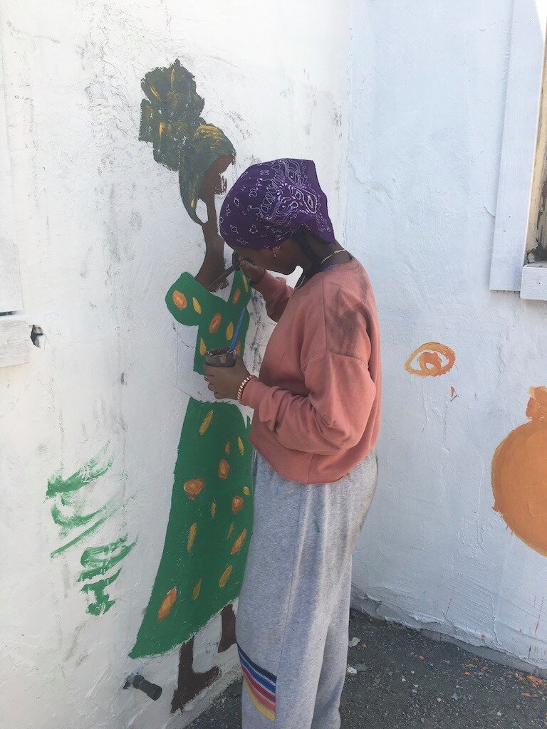 Hope mural girl painter.jpg